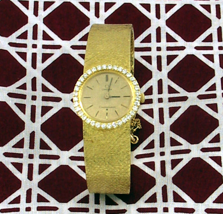 Omega Lady's Yellow Gold and Diamond Constellation Bracelet Watch In Excellent Condition In Palm Beach, FL