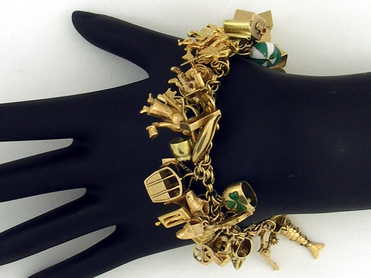 Gold Bracelet Loaded with Charms 1