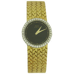 Piaget Lady's Yellow Gold and Diamond Bracelet Watch with Onyx Dial 12