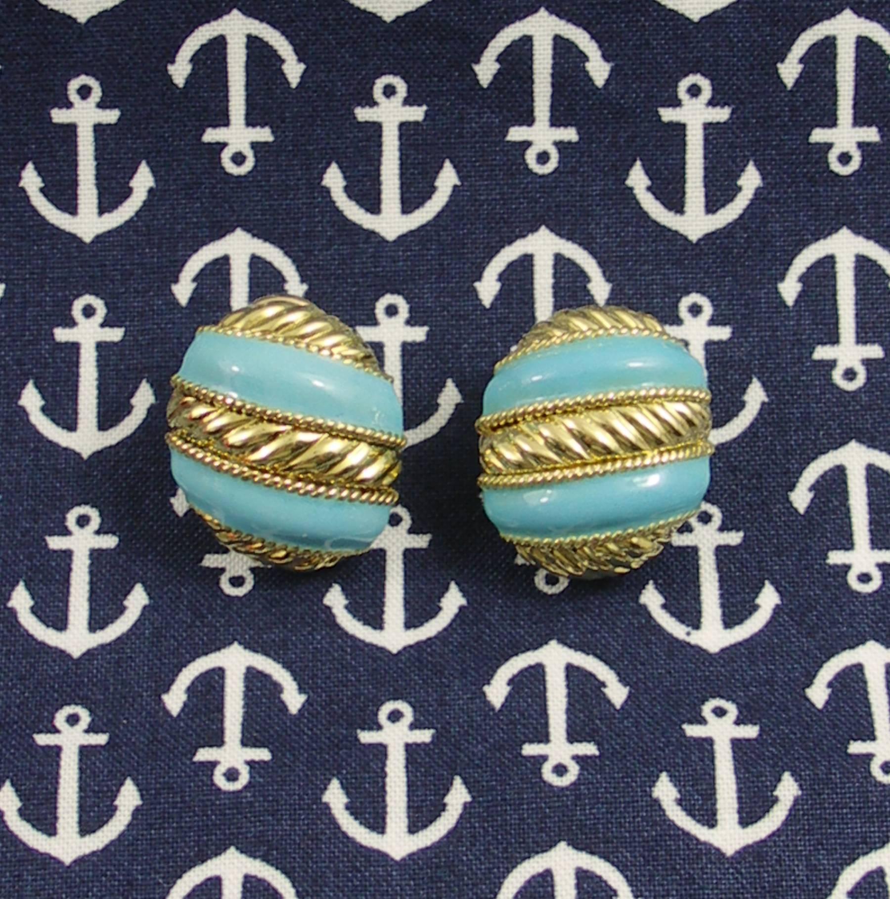 A pair of ladies 18K yellow gold earrings measuring 1 inch long and 7/8 of an inch wide, with a twisted rope design, and colored with turquoise blue enamel.