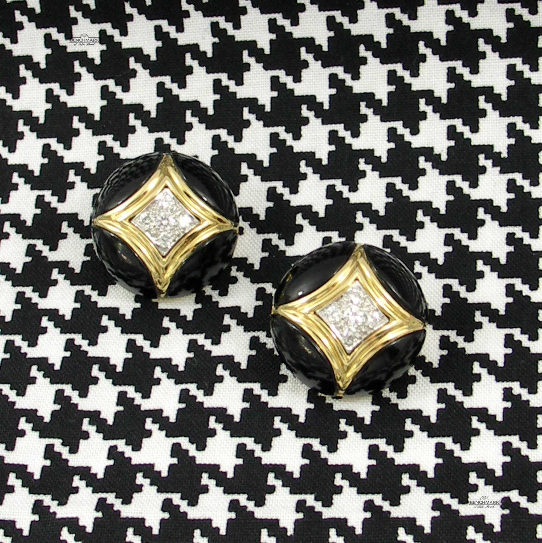 A pair of Van Cleef and Arpels onyx and diamond earrings in 18K yellow gold, centered around 5 pave' set round brilliant cut diamonds, outlined by a starburst design of gold, and embellished with onyx. Diamonds weigh a total of approximately 0.66ct