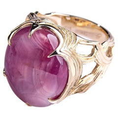 Bague de fiançailles grande taille en or avec rubis étoilé et pierre rouge