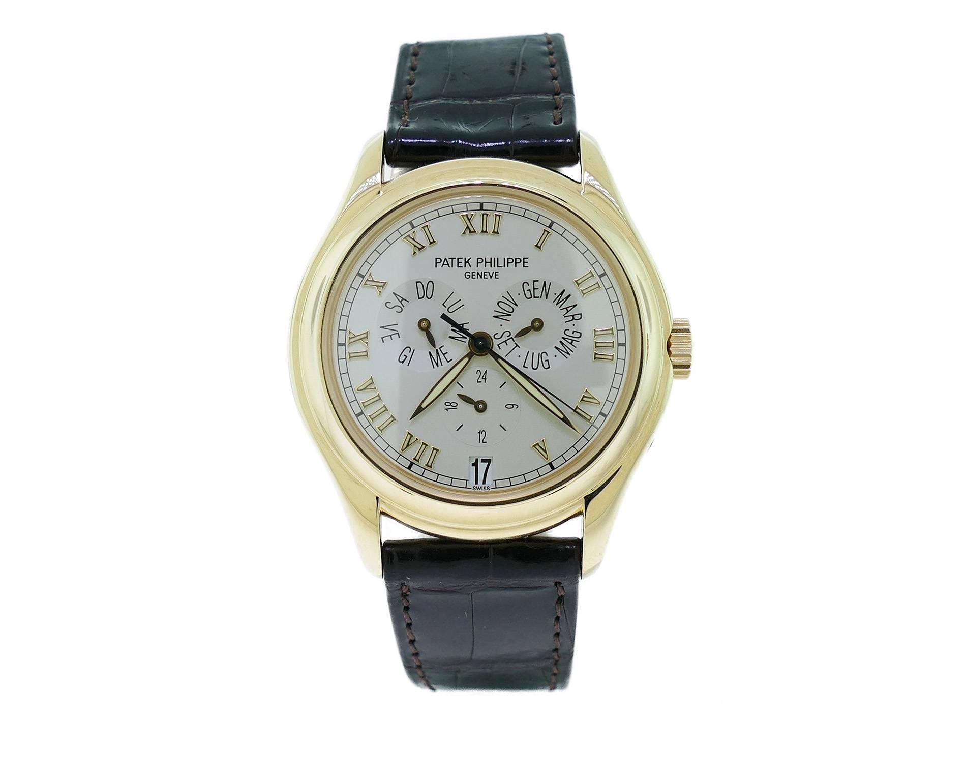 Mens 37mm Patek Philippe Ref 5035J Annual Calendar 18k Yellow Gold Watch. The Watch is in Excellent Condition & All functions are Working Great, Movement is Powered by Automatic Mechanical Winding. Dial Is in Spanish. The Watch is on a Patek Strap &