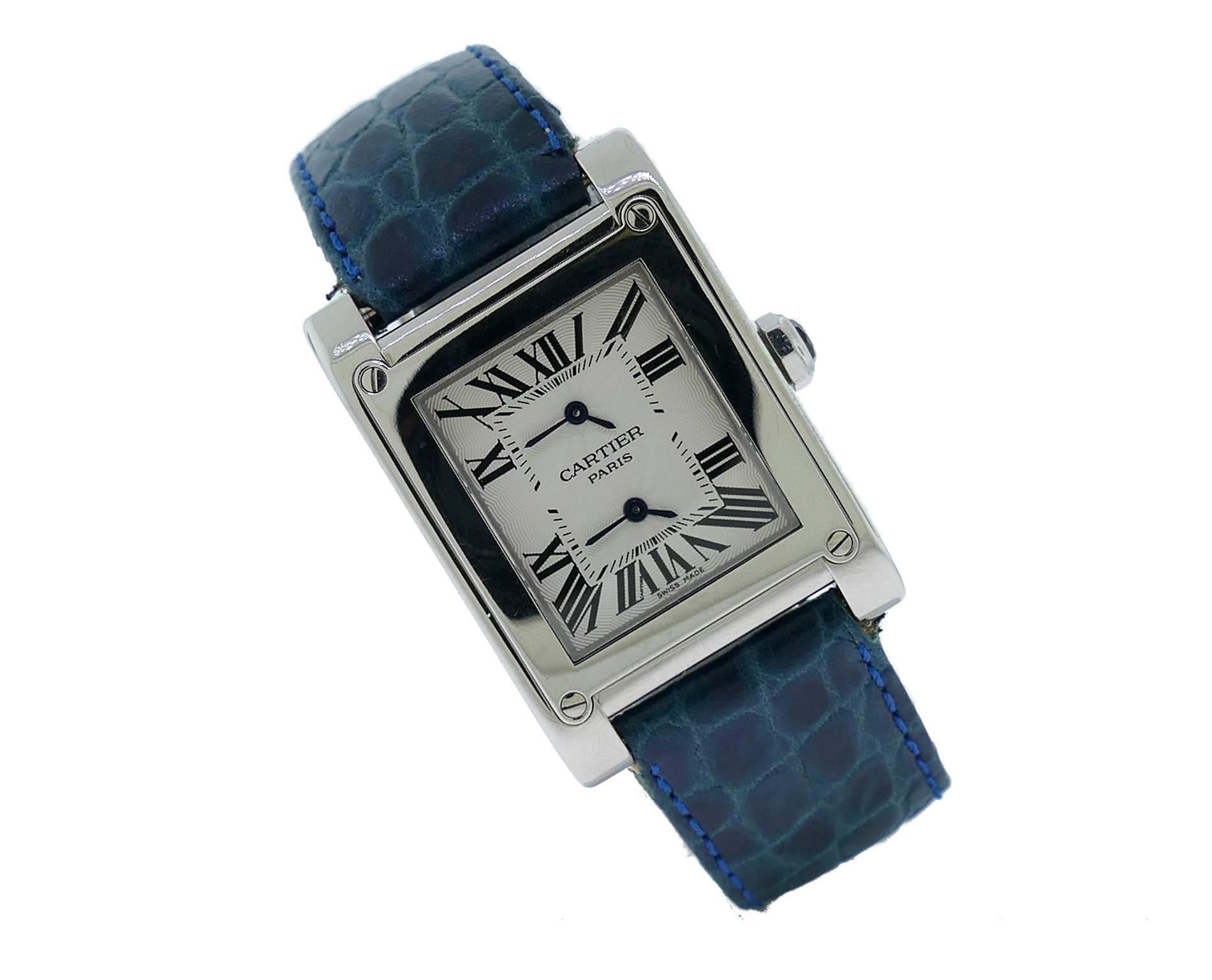 Mens (28x35mm) Cartier Privee Tank A Vis Dual Time 18k White Gold Watch. The Watch is in Great Condition & Keeping Great Time, Movement is Operated by Mechanical Hand Winding. The Watch is on a Generic Strap & Cartier 18k Deployment Buckle. Included