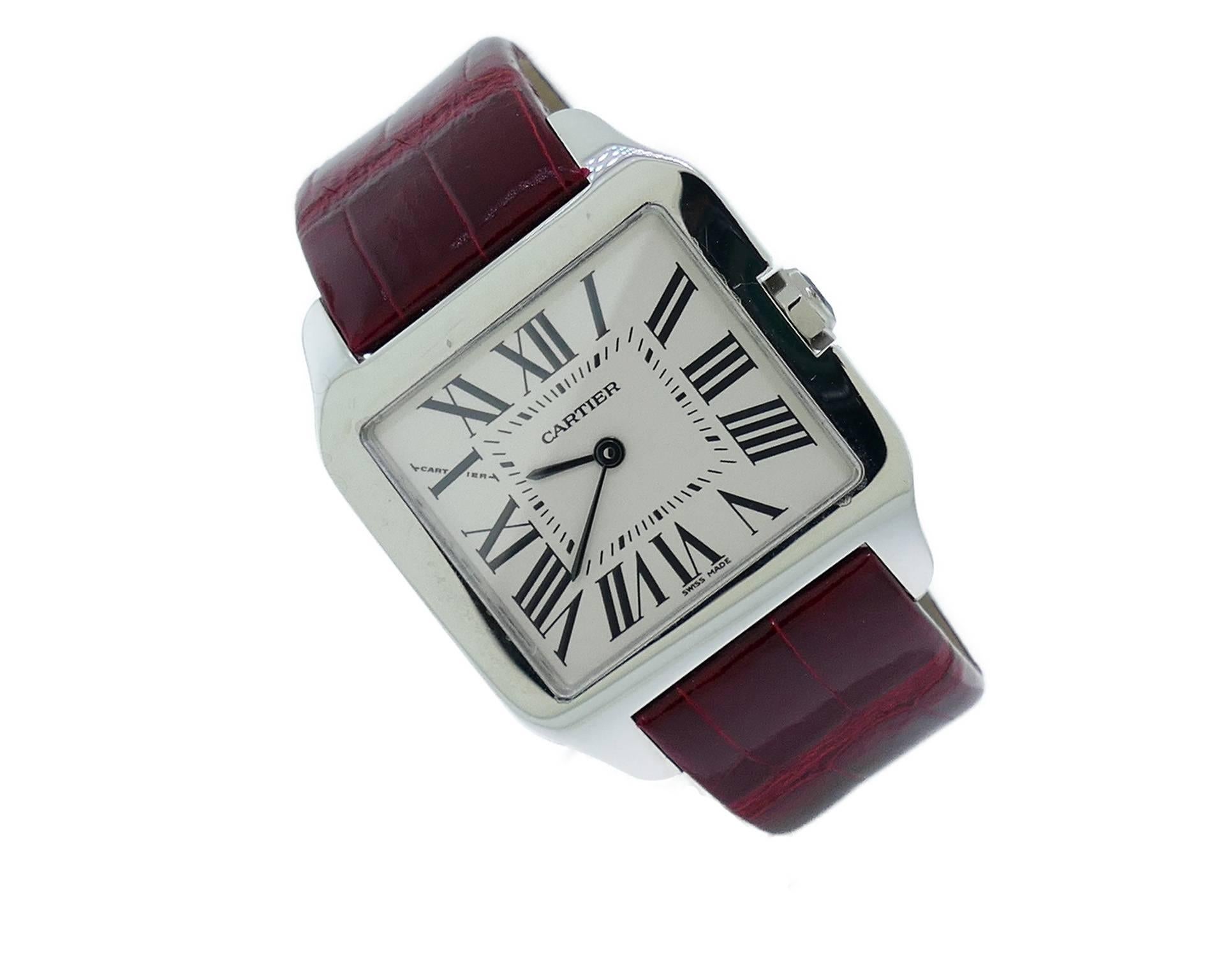 Small (30mm) Cartier Santos Dumont in 18k White Gold On Strap, Ref W2009451, Retails $13,600. The Watch is in Excellent Condition and Keeping Perfect Time, Movement is Battery Operated. The Watch is on Cartier Strap & 18k Deployment Buckle. The