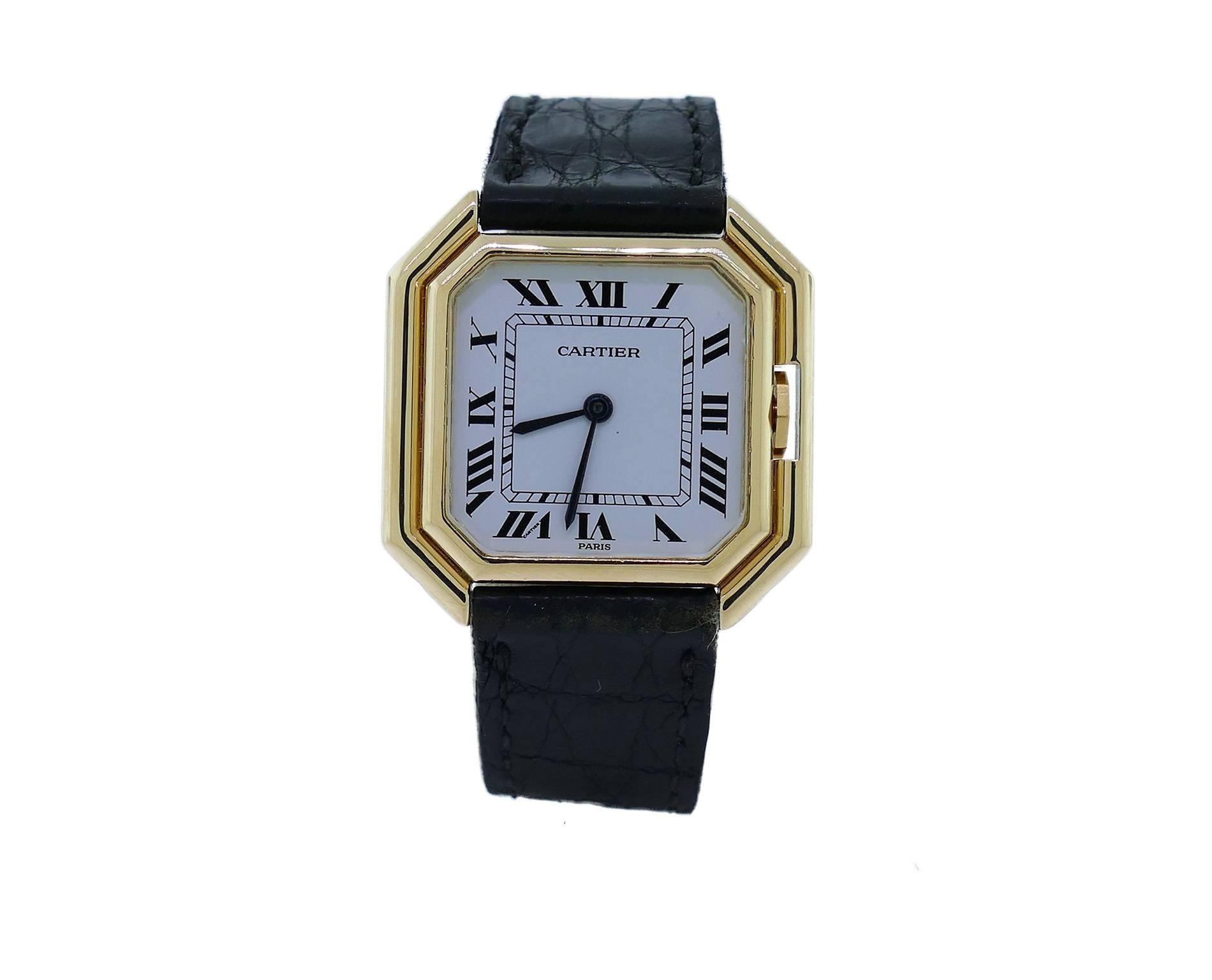 Vintage & Rare Mens Cartier Ceinture Large (30x31) Automatic 18k Yellow Gold Watch. The Watch is in Great Condition & Keeping Perfect Time, Movement is Powered by Automatic Mechanical Winding. The Watch is on a Generic Strap & Cartier 18k Deployment
