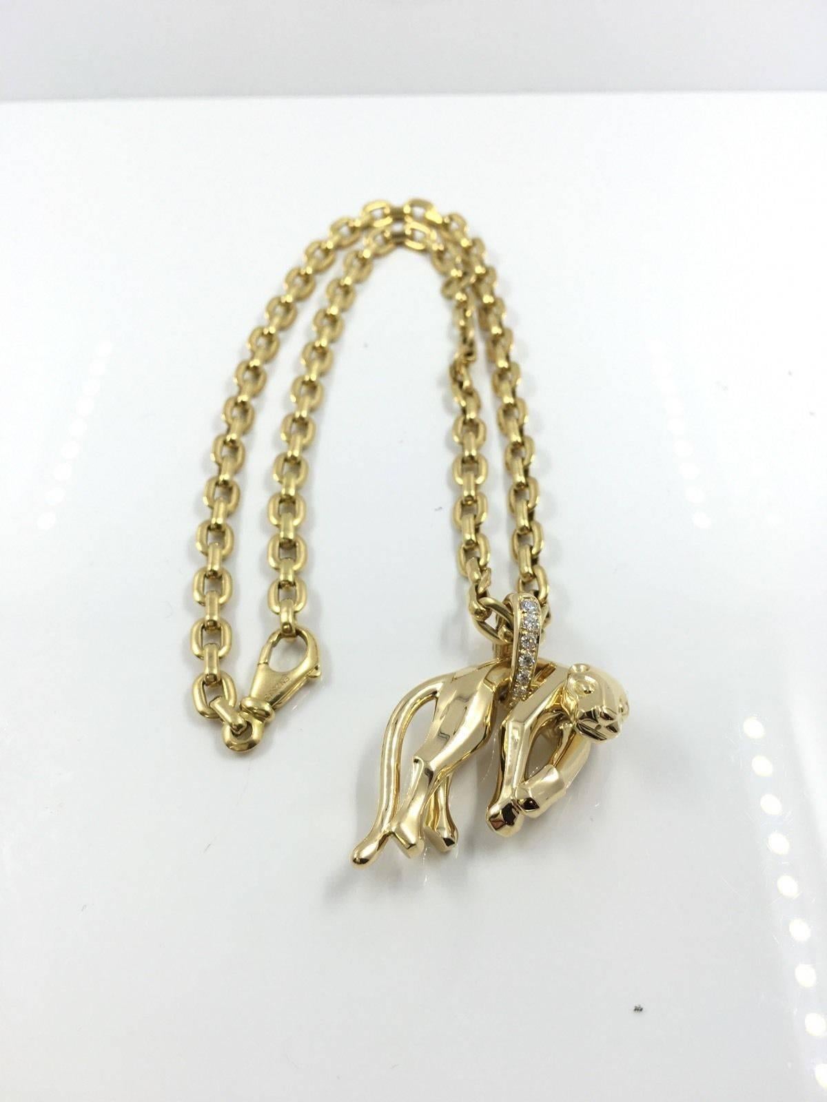Cut: Excellent
Clarity: vvs
Total Carat Weight: 0.50
Style: Pendant
Metal: 18k
Diamond Color: F

This piece from Cartier's famed Panthere collection is sure to turn heads, and garner much attention. The pendant is made of 18K yellow gold with