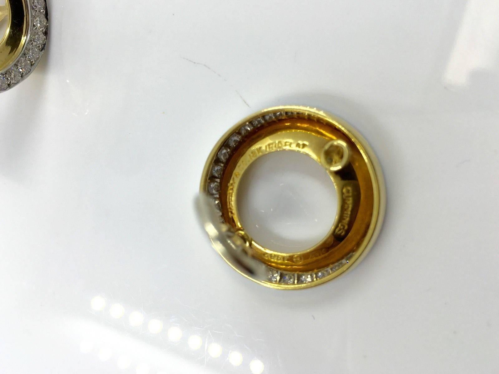 
Metal Type: platinum 18K Yellow Gold
Hallmark: 750
Signature: tiffany&co cummings 
Metal Finish: High Polish
Total Item Weight (g): 19 gram
Estimated Retail: 
Condition: Excellent. 
Measurements: 
