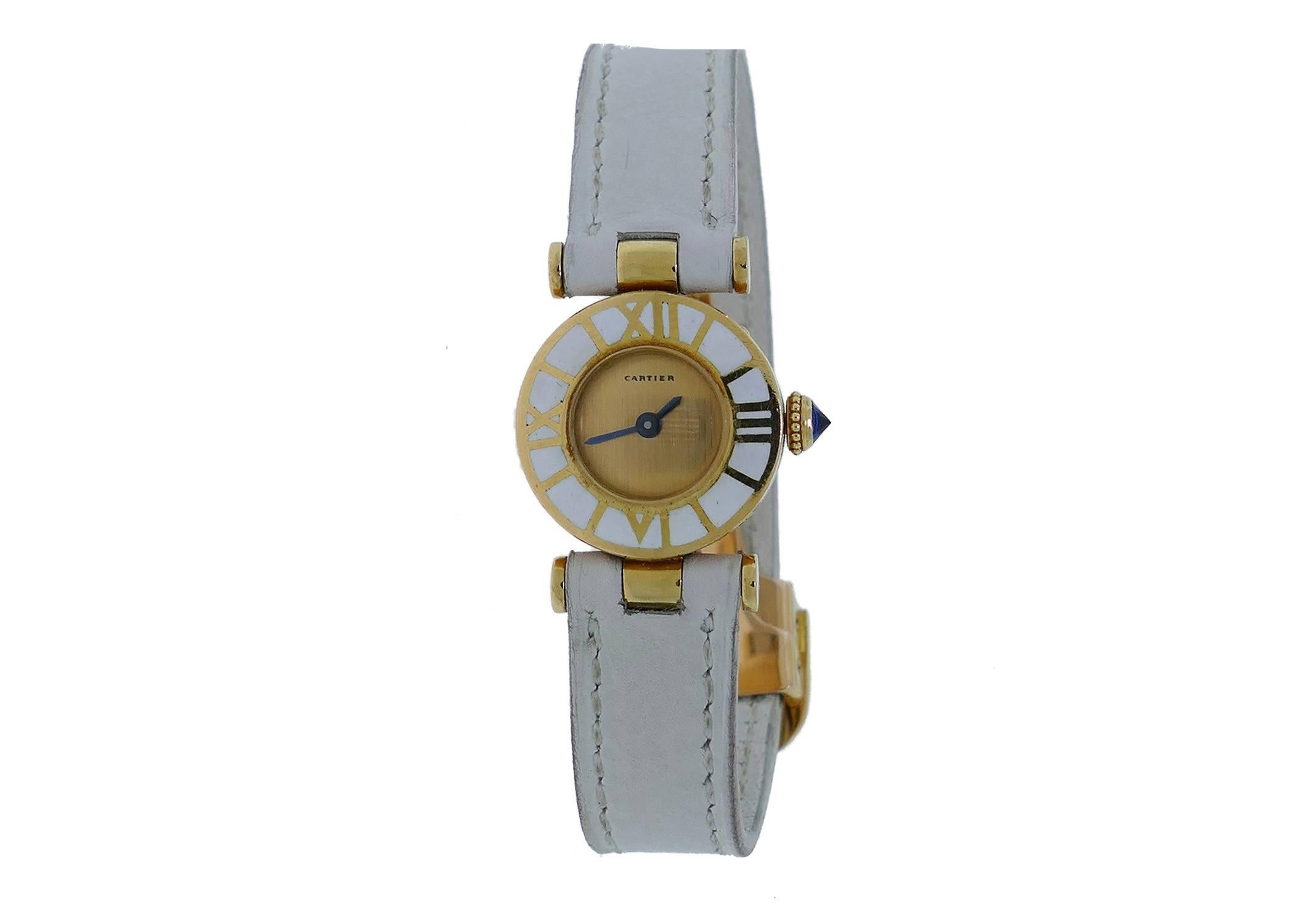 Offered For Sale is a Vintage Ladies (23mm) Cartier 18k Yellow Gold Enamel Watch. The Watch is in Great Condition & Keeping Perfect Time; Movement is Operated by Mechanical Hand Winding. The Watch is on a Cartier Strap & Cartier 18k Deployment