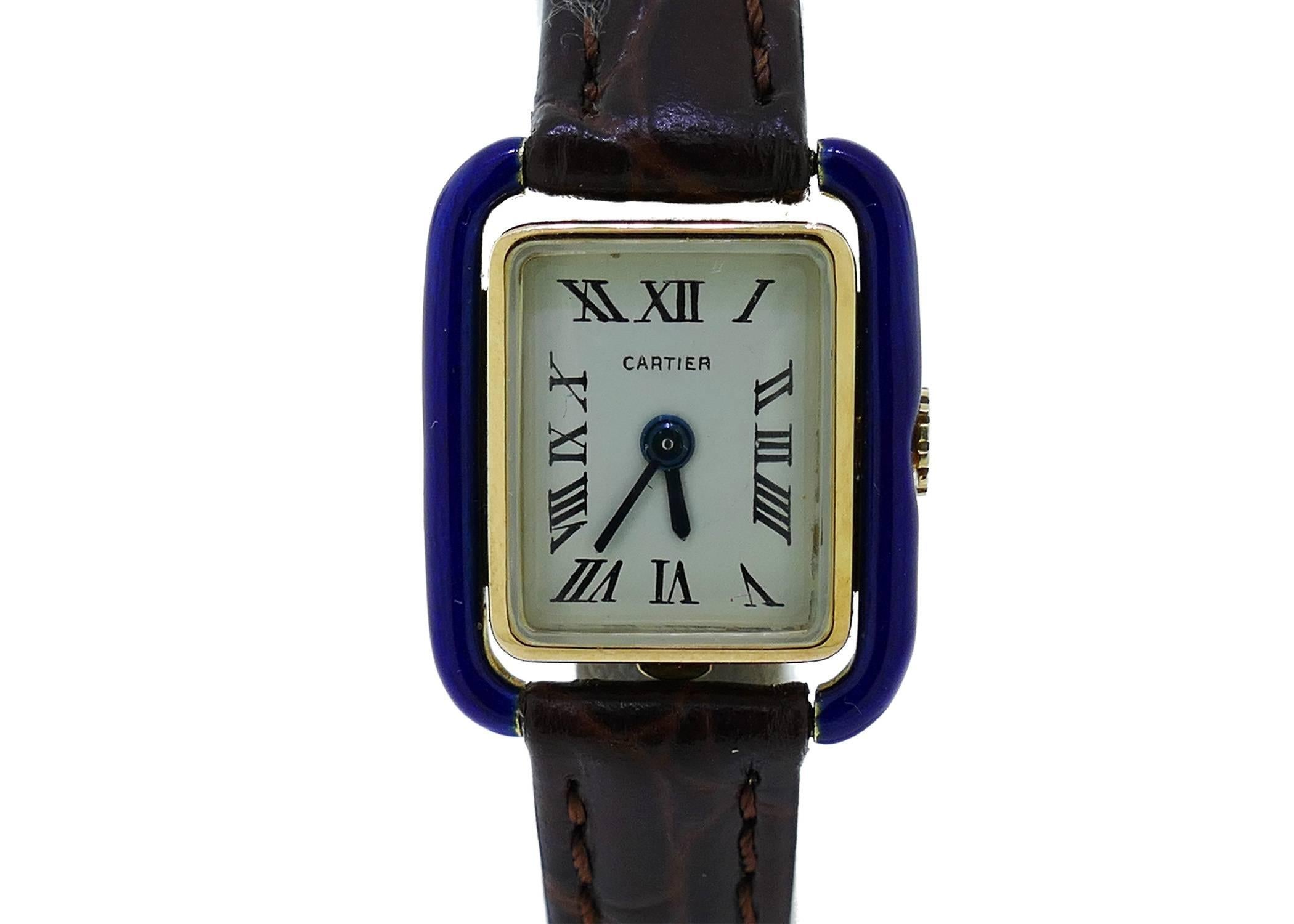 Offered For Sale is a Vintage Early Cartier Ladies (18x22mm) Rectangular 18k Yellow Gold Watch w/ Blue Enamel. The Watch is in Great Condition & Keeping Great Time, Movement is Operated by Mechanical Hand Winding. The Watch is on a Generic Strap &