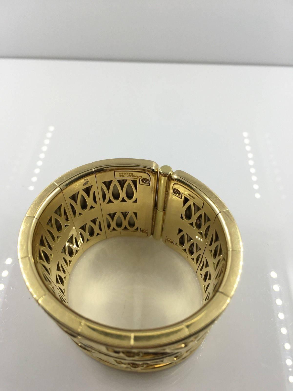 Cartier Large Two Row Walking Panther Two Color Gold Bangle Bracelet In Excellent Condition In Miami, FL