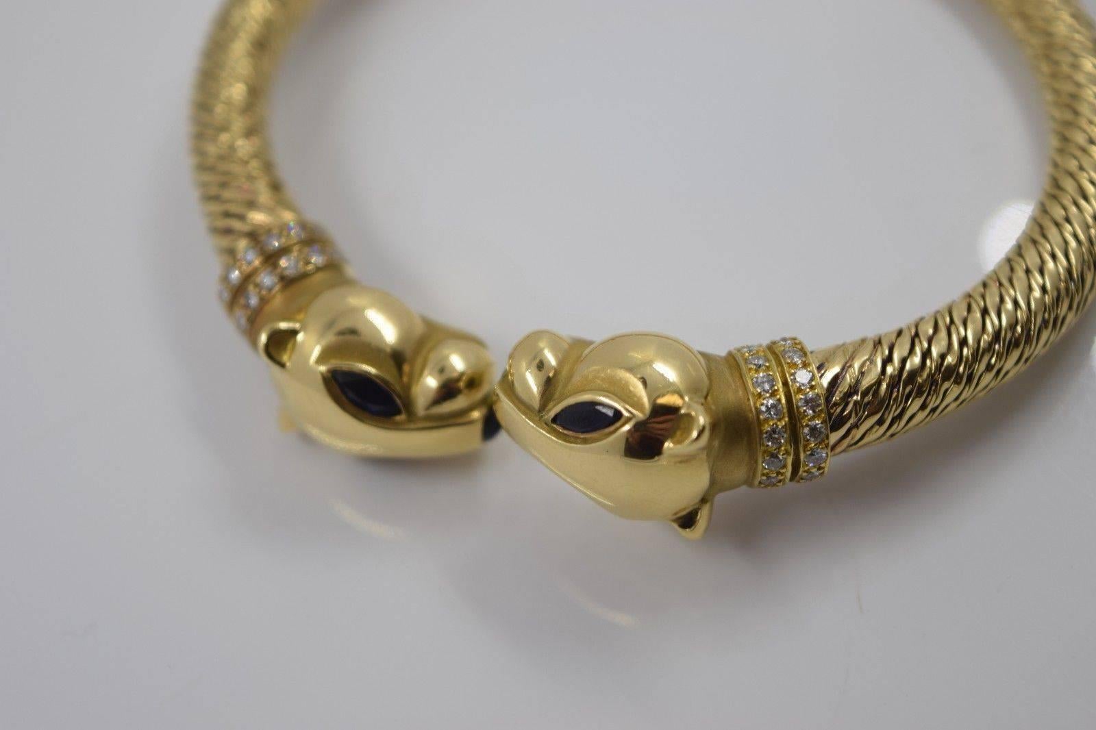 Women's or Men's 1970s Cartier Paris Sapphire Onyx Diamond Gold Panther Bracelet