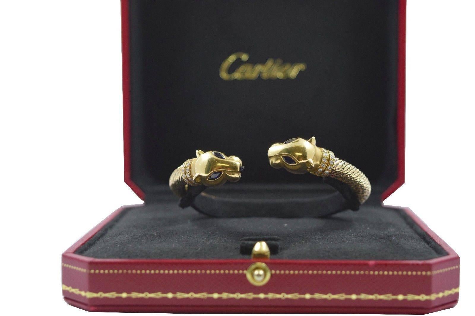 1970s Cartier Paris Sapphire Onyx Diamond Gold Panther Bracelet In Excellent Condition In Miami, FL