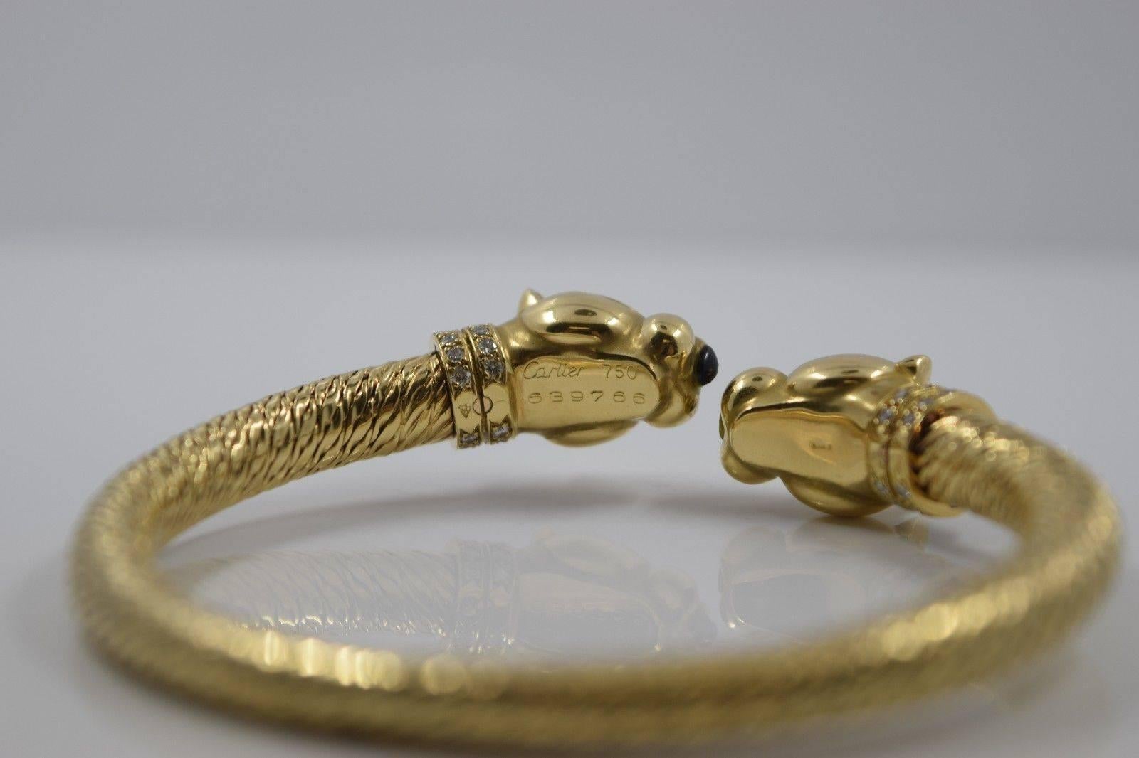 1970s Cartier Paris Sapphire Onyx Diamond Gold Panther Bracelet 4