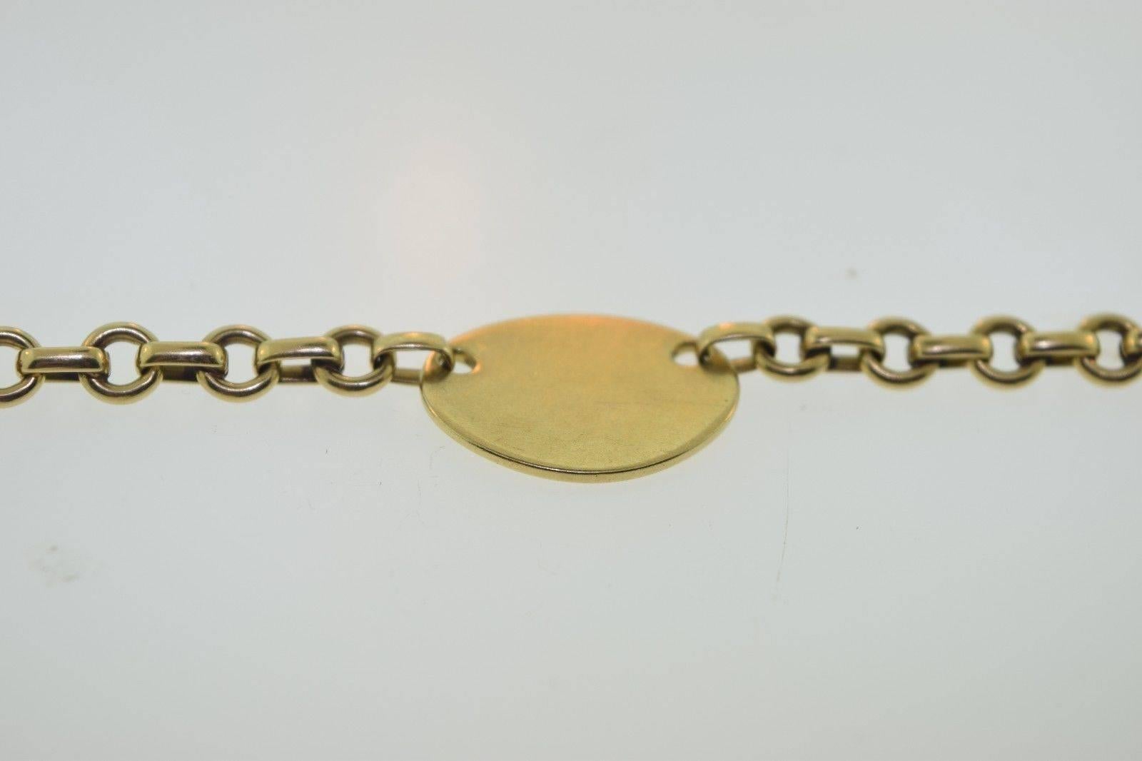 Women's or Men's 1980s Tiffany & Co. Gold “Return to Tiffany” Oval Tag Bracelet 