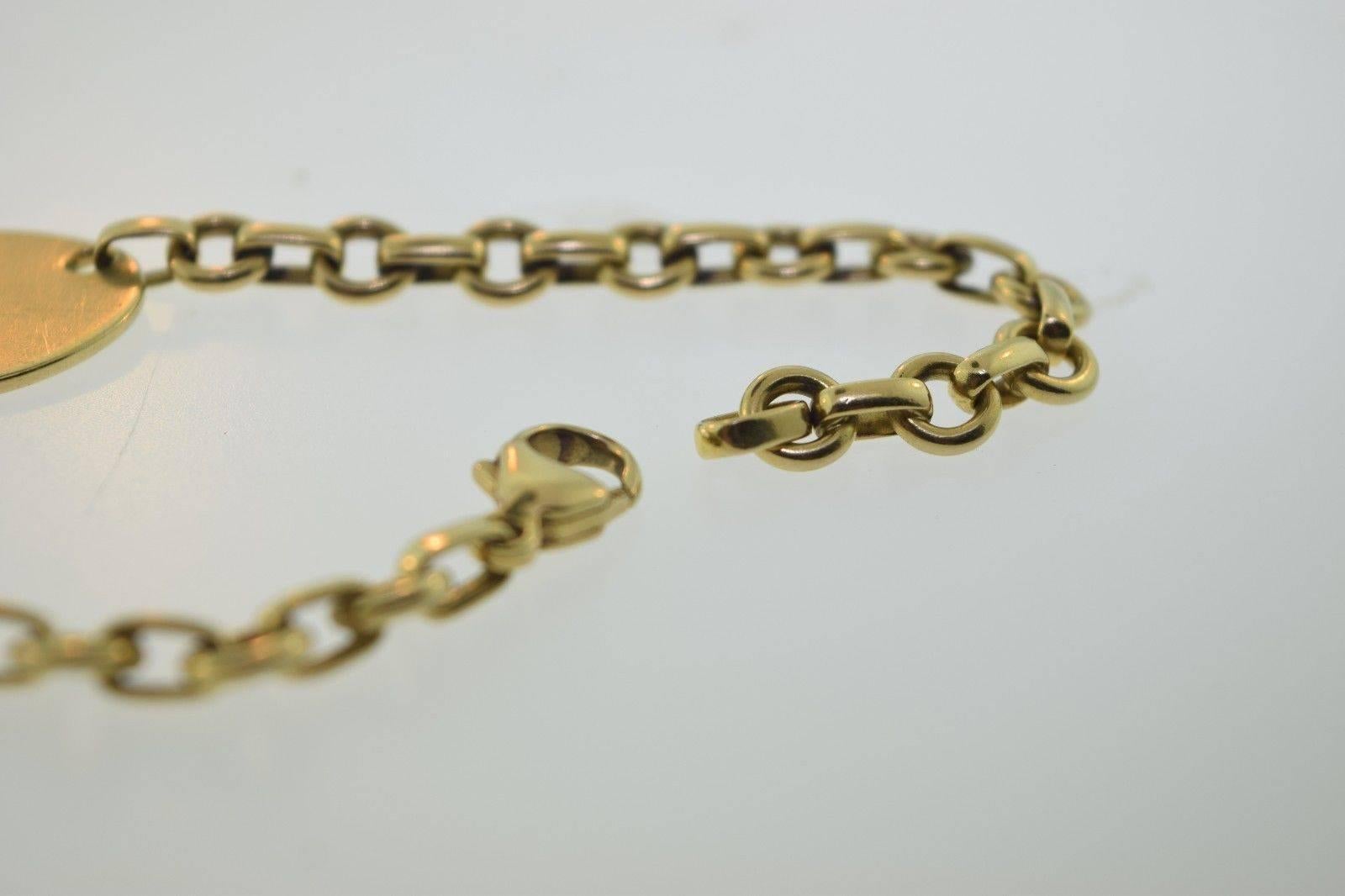 1980s Tiffany & Co. Gold “Return to Tiffany” Oval Tag Bracelet  In Excellent Condition In Miami, FL
