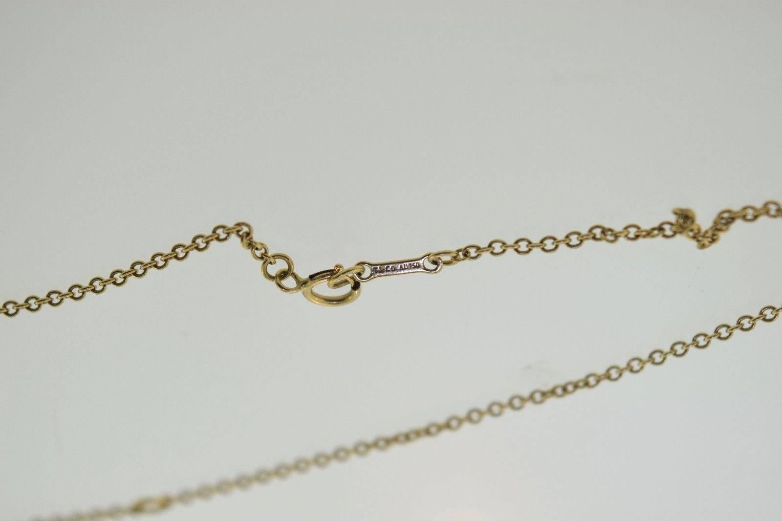 Tiffany & Co. Gold Swirl Spiral Necklace Pendant  1