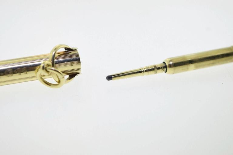 Tiffany and Co. Antique Gold Hidden Pencil Pendant Necklace at 1stDibs