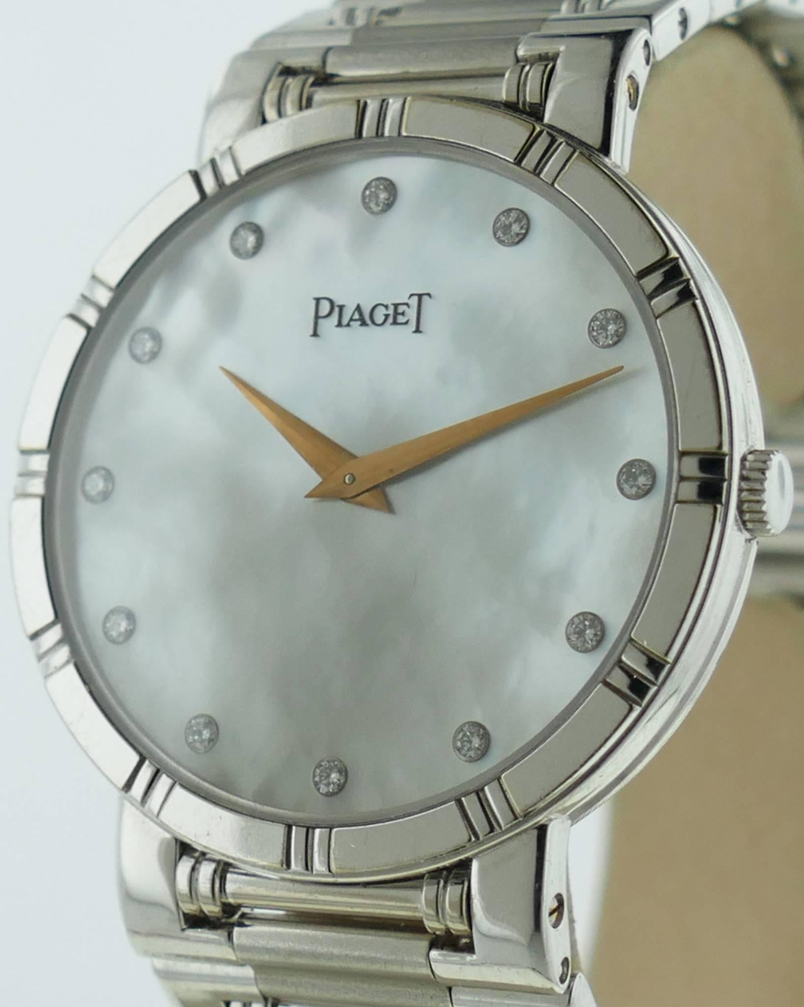 Ladies (31mm) Piaget Dancer 18k White Gold Mother Of Pearl Diamond Dial Watch. The Watch is in Great Condition & Keeping Great Time; Movement is Battery Operated. The Watch fits up to a appx 6 3/4 Inch Wrist. No box or papers. The Watch is