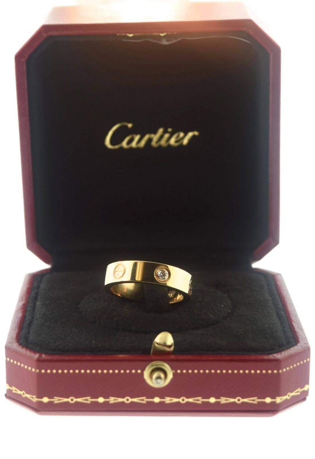 Cartier Yellow Gold LOVE Ring with 3 Diamonds, Size 9 In Excellent Condition In Miami, FL