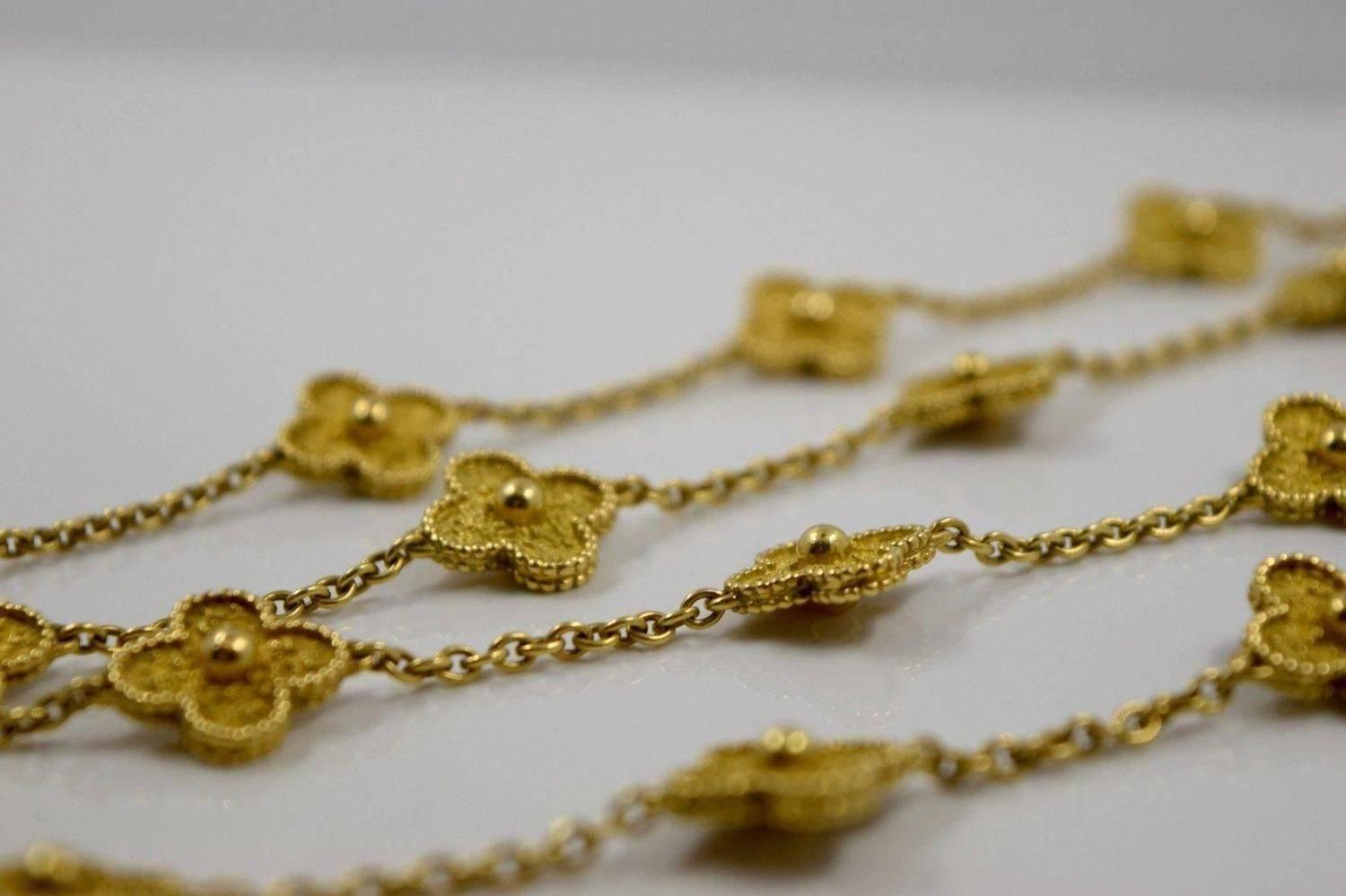 This classic long Van Cleef & Arpels necklace from the iconic Vintage Alhambra collection is crafted in 18k yellow gold and features 20 lucky clover motifs with round bead edges. Made in France circa 1980s.

Metal: 18k Yellow Gold
Brand: Van