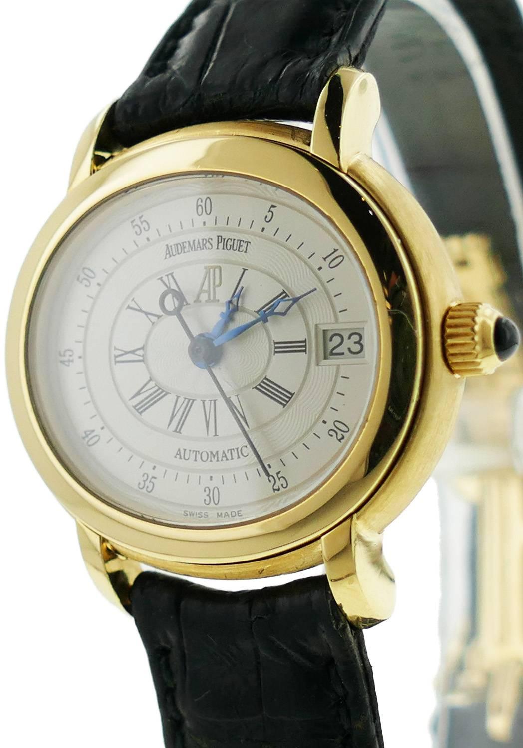 Ladies (27mm) Audemars Piguet Millenary 18k Yellow Gold Wrist Watch. The Watch is in Excellent Condition & Keeping Perfect Time; Movement is Powered by Automatic Mechanical Winding. The Watch is on a AP Strap & 18k Deployment Buckle. No box