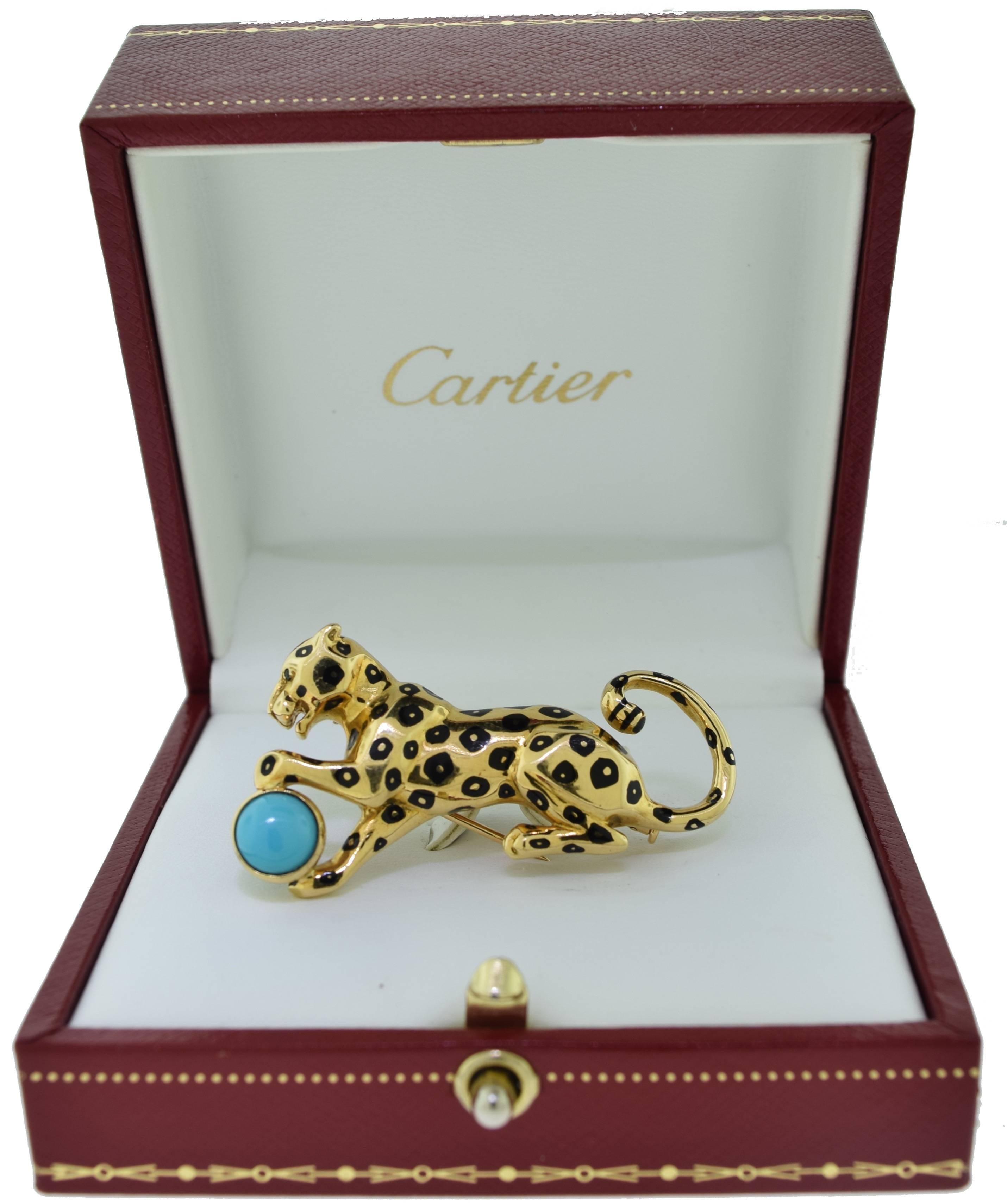 DESIGNER: Cartier
METAL: Yellow Gold
METAL PURITY: 18k
GEMSTONE: Turquoise
NON-METAL MATERIAL: Black Enamel
TOTAL ITEM WEIGHT (GRAMS): 17.17
LENGTH: 2.08 inches
WIDTH: 1.21 inches
THICKNESS: 0.52 inches
HALLMARK: 750, SERIAL