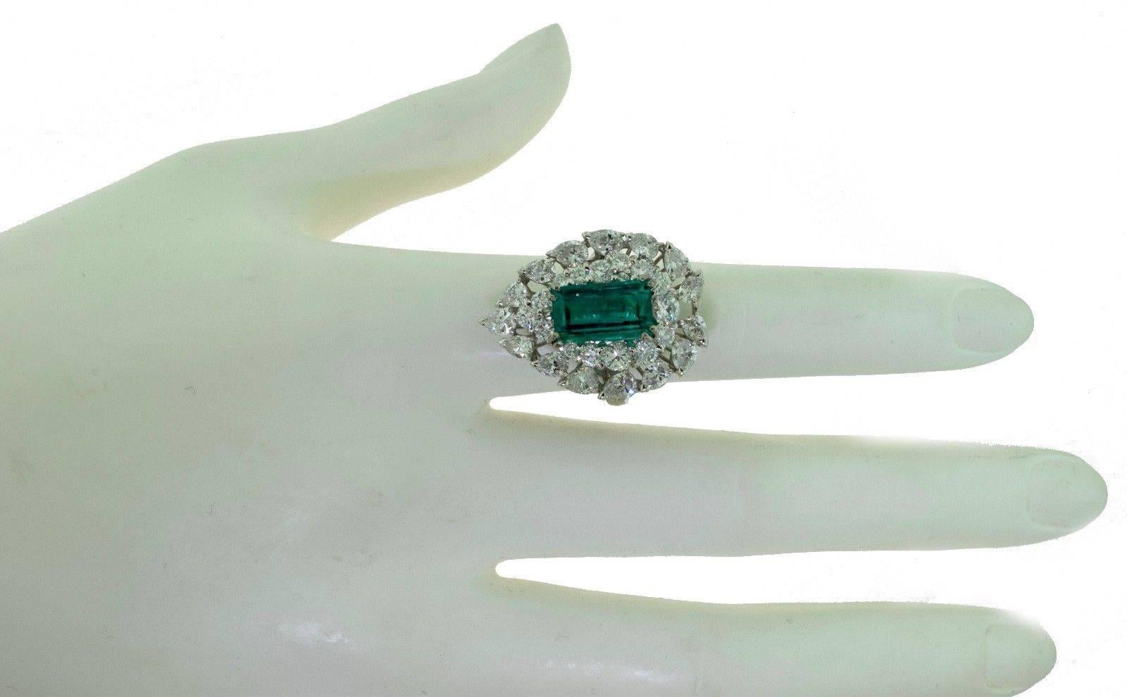 Metal: White Gold
Metal Purity: 18k
Stones: Emerald, Diamonds
Total Item Weight (grams): 9.6
Ring Size: 6.75 - 7 (can be sized upon request)
Total Carat Weight: 8 ct

EMERALD SPECIFICATIONS:
Mineral Type: Natural Beryl
Variety: