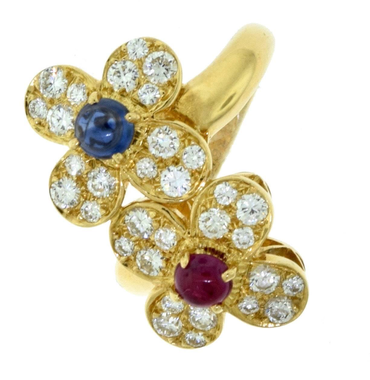 Designer: Van Cleef & Arpels
 
Metal: 18k Yellow Gold
Stones: Diamonds, Rubies, Sapphires
Diamond Color: DEF
Diamond Clarity: IF - VVS
Diamond Carat Weight: 0.36 ct
Ruby Carat Weight: 0.25 ct
Sapphire Carat Weight: 0.36 ct
Total Carat