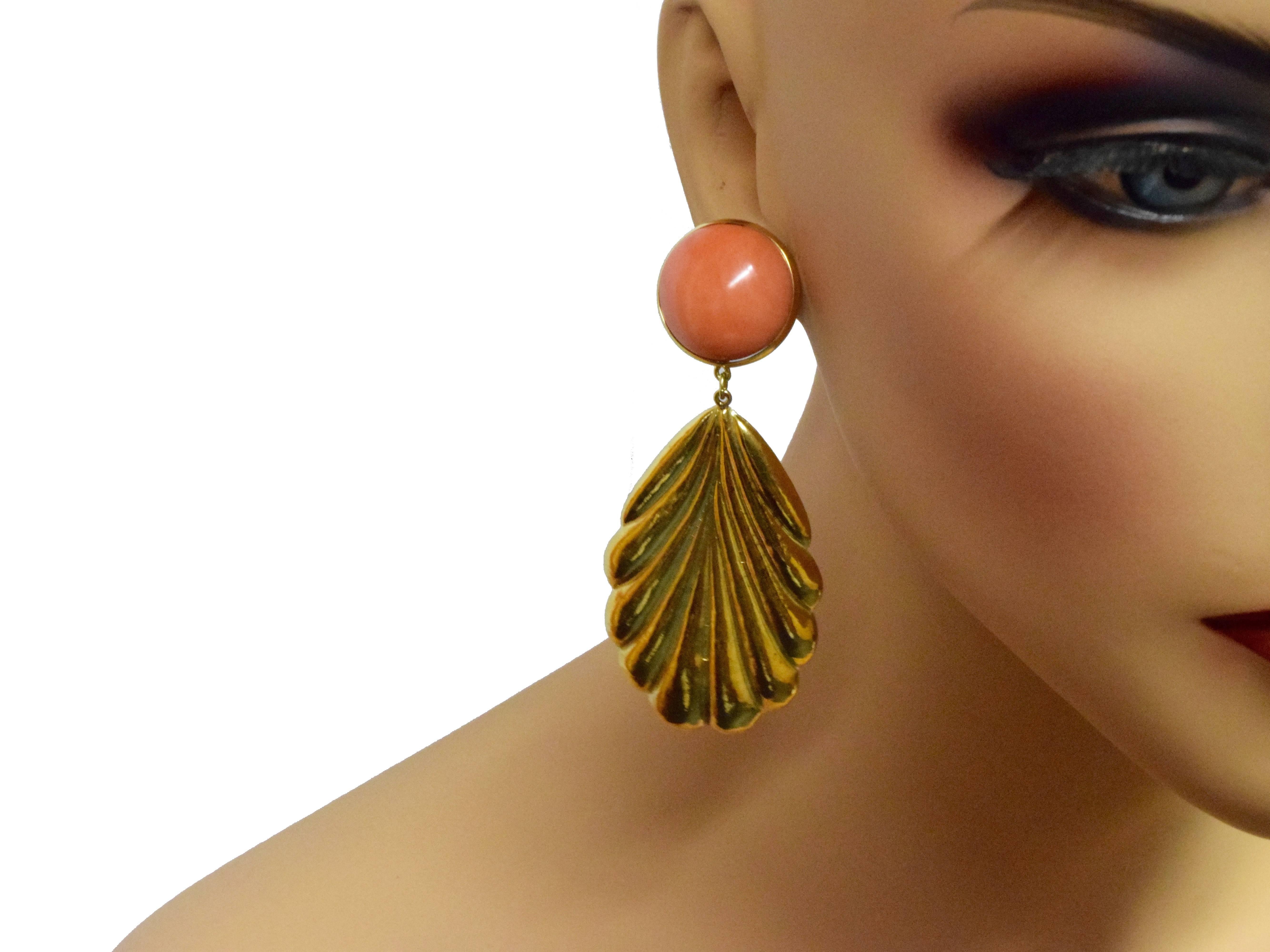 Very Dramatic Large Gold Leaf Earrings

Metal: 18k Yellow Gold
Total Item Weight (grams): 36.8 
Leaf Length: 2.30 inches
Leaf Width: 1.41 inches
Coral Diameter: 21.1 mm
Coral Thickness: 11.5 mm
Total Earring Length: 3.10 inches
