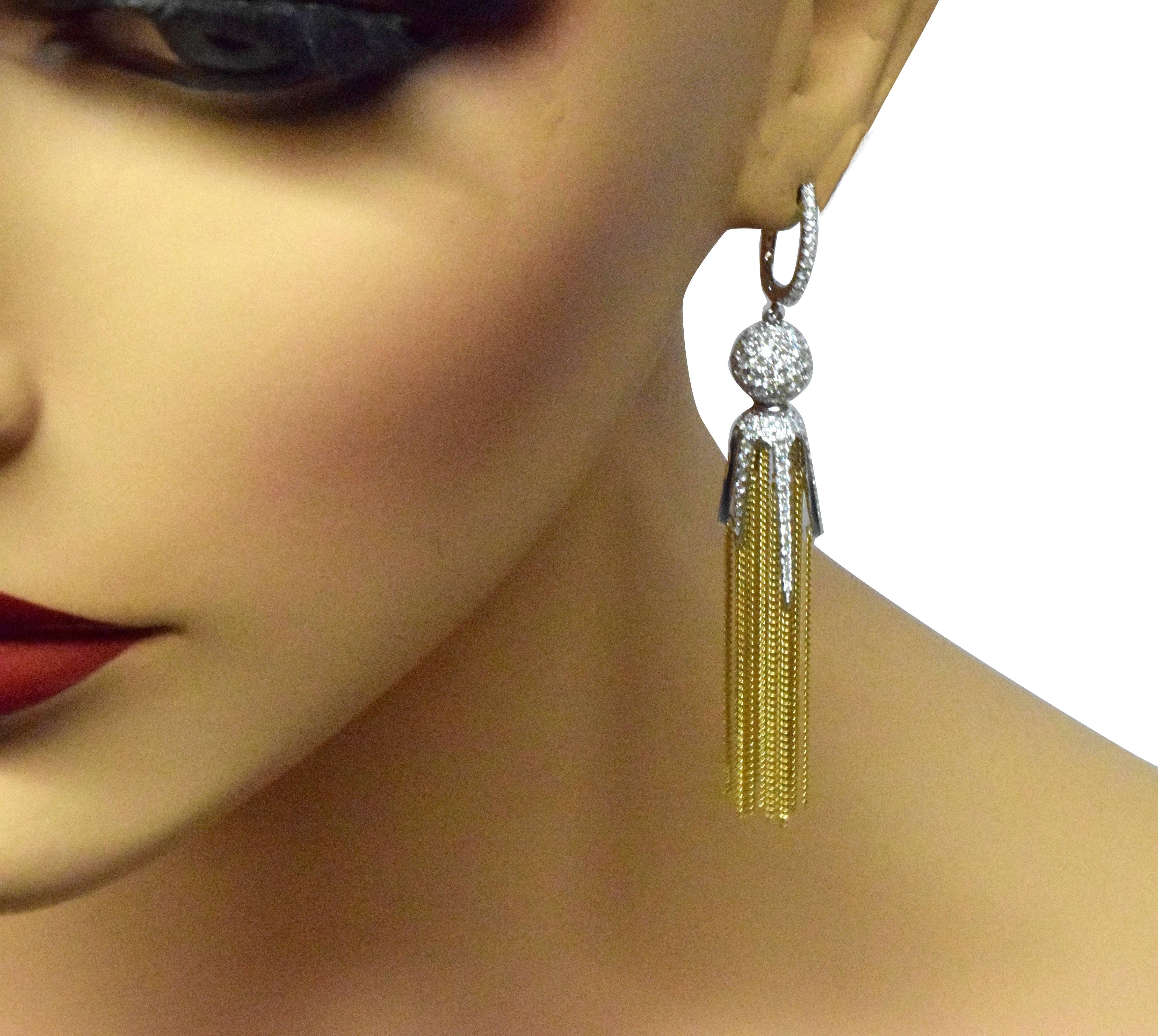 Type: Tassel Earrings
Metal: 18k Yellow Gold & 18k White Gold
Stones: 268 Round Diamonds
Diamond Ball Diameter: 9.24 mm
Approx. Earring Length: 3 inches
Total Carat Weight: 2.76 carat
Total Item Weight (g): 23.0