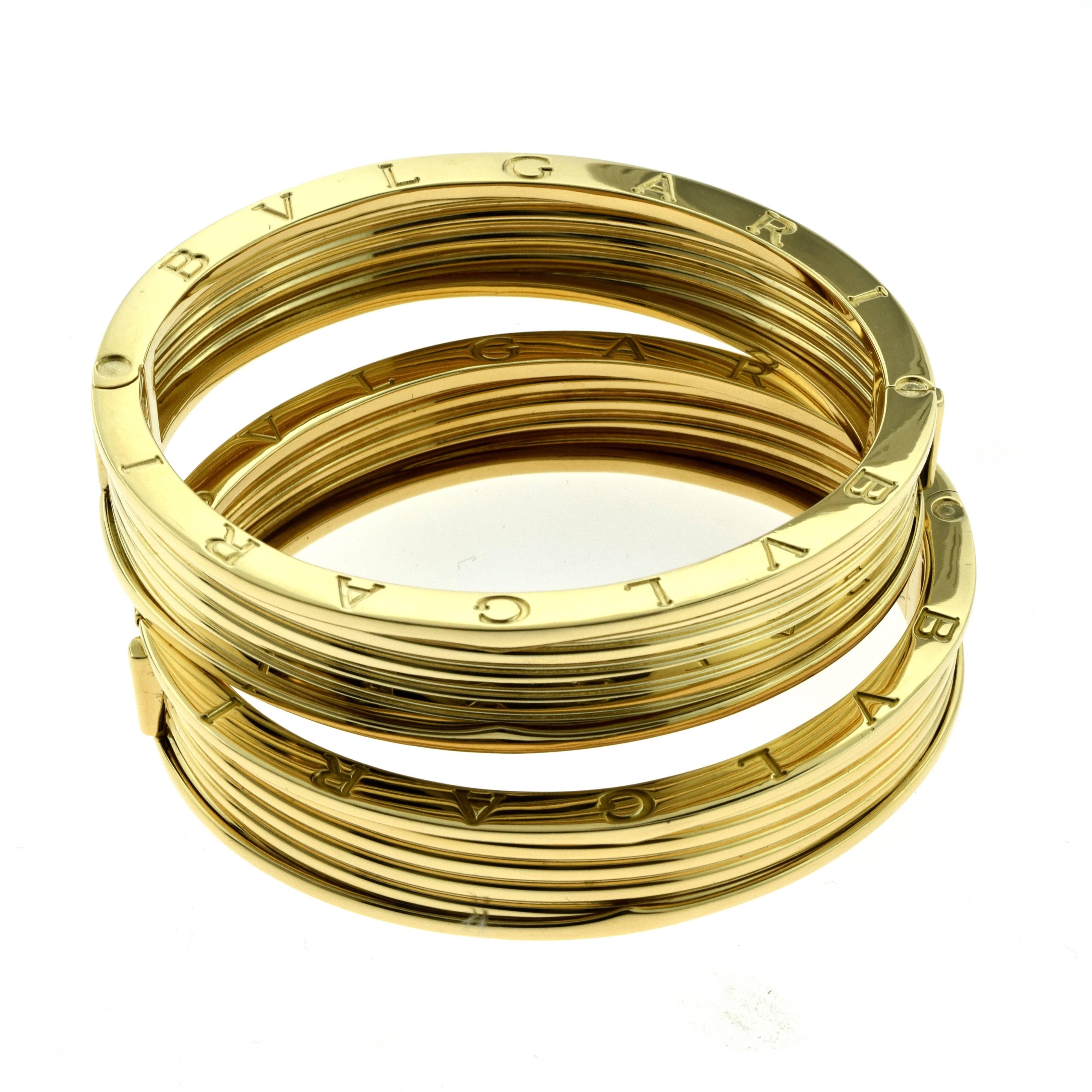 Type: 2 Large Wide Bangles
Hallmarks: BVLGARI Made in Italy 750 Serial Number

BRACELET 1
Total Item Weight (g): 84.0
Inner Measurement (North to South): 2.25 inches
Inner Measurement (East to West): 2.6 inches
Width: 0.59 inches

BRACELET 2
Total