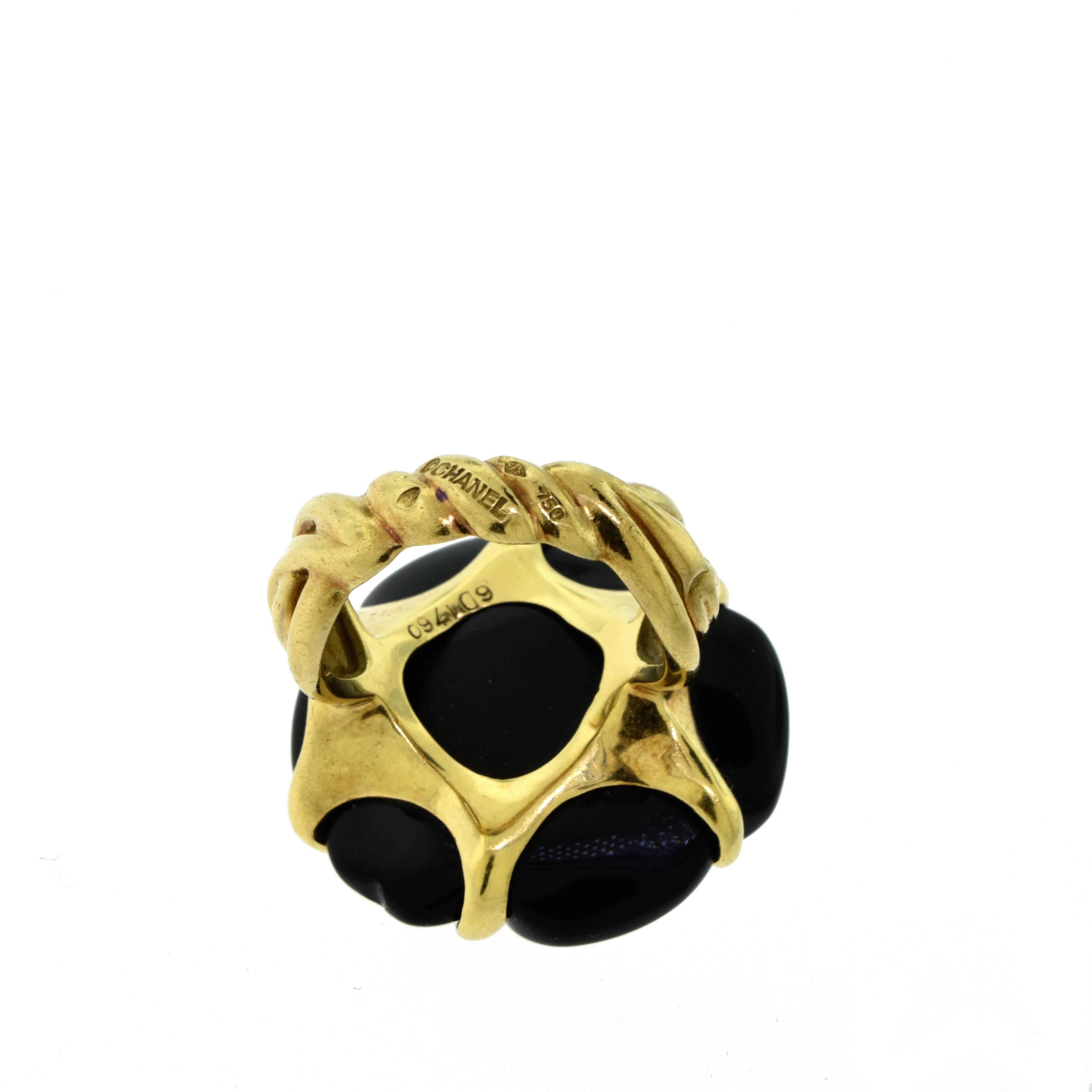 Women's or Men's Chanel Camellia Camelia Carved Black Onyx Flower Ring in 18 Karat Yellow Gold For Sale