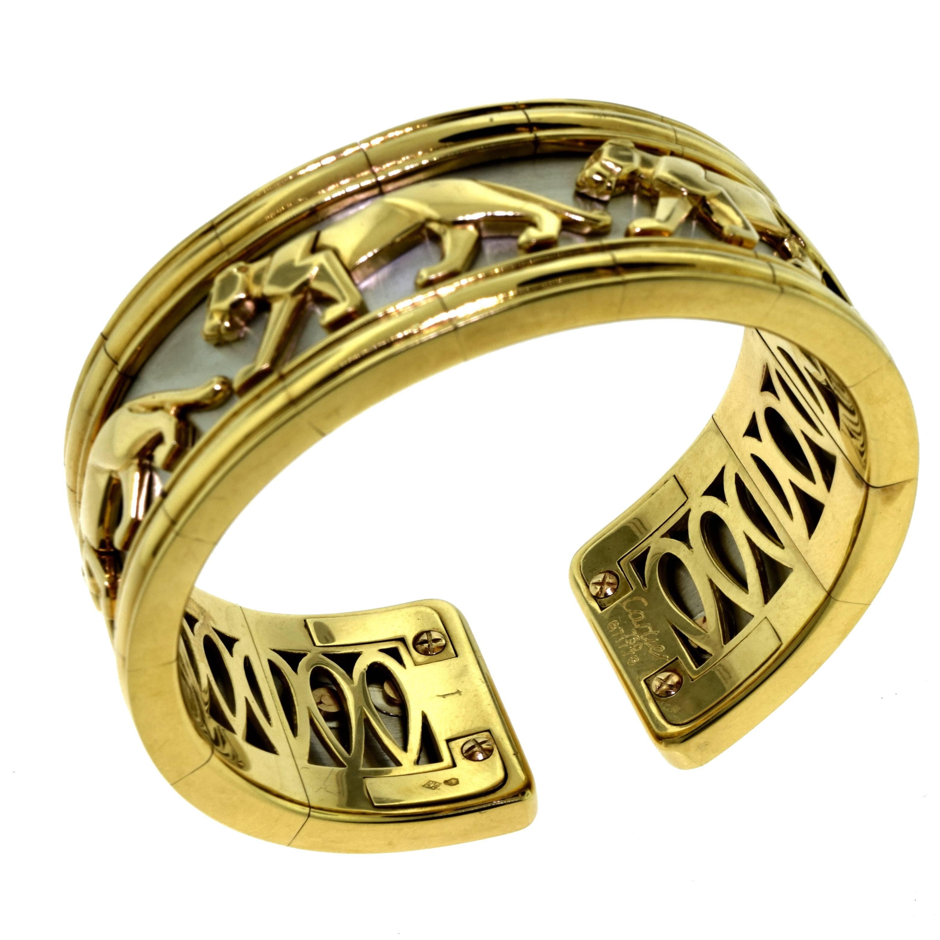Designer: Cartier
Collection: Pharaon
Metal: 18 Karat Yellow Gold , 18 Karat White Gold
Bracelet Size: Flexible. (Fits Small to Large wrist)
Cuff Width: 0.935 inches (23.72 mm)
Total Item Weight (g): 109.8
Hallmark: 1 Cartier Serial No.
** we also