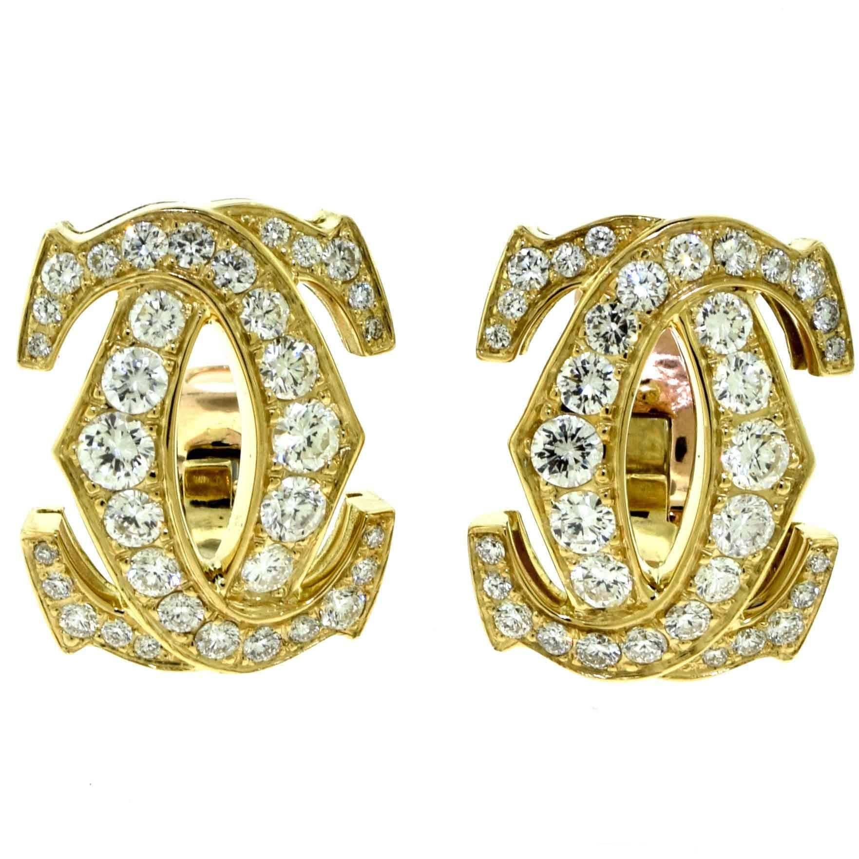 Cartier Signature Double-C 18 Karat Yellow Gold Diamond Clip on Earrings For Sale