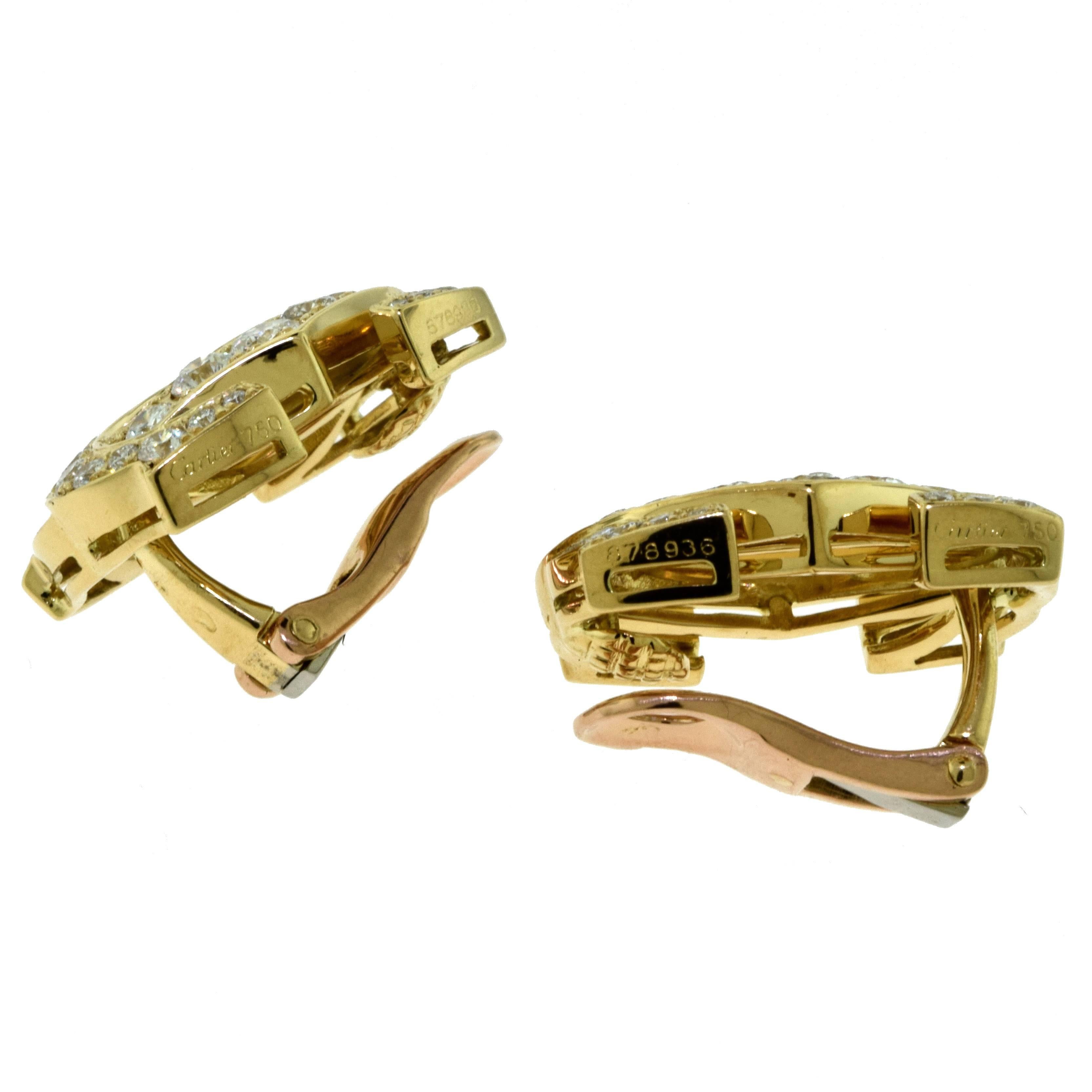 Cartier Signature Double-C 18 Karat Yellow Gold Diamond Clip on Earrings In Excellent Condition For Sale In Miami, FL