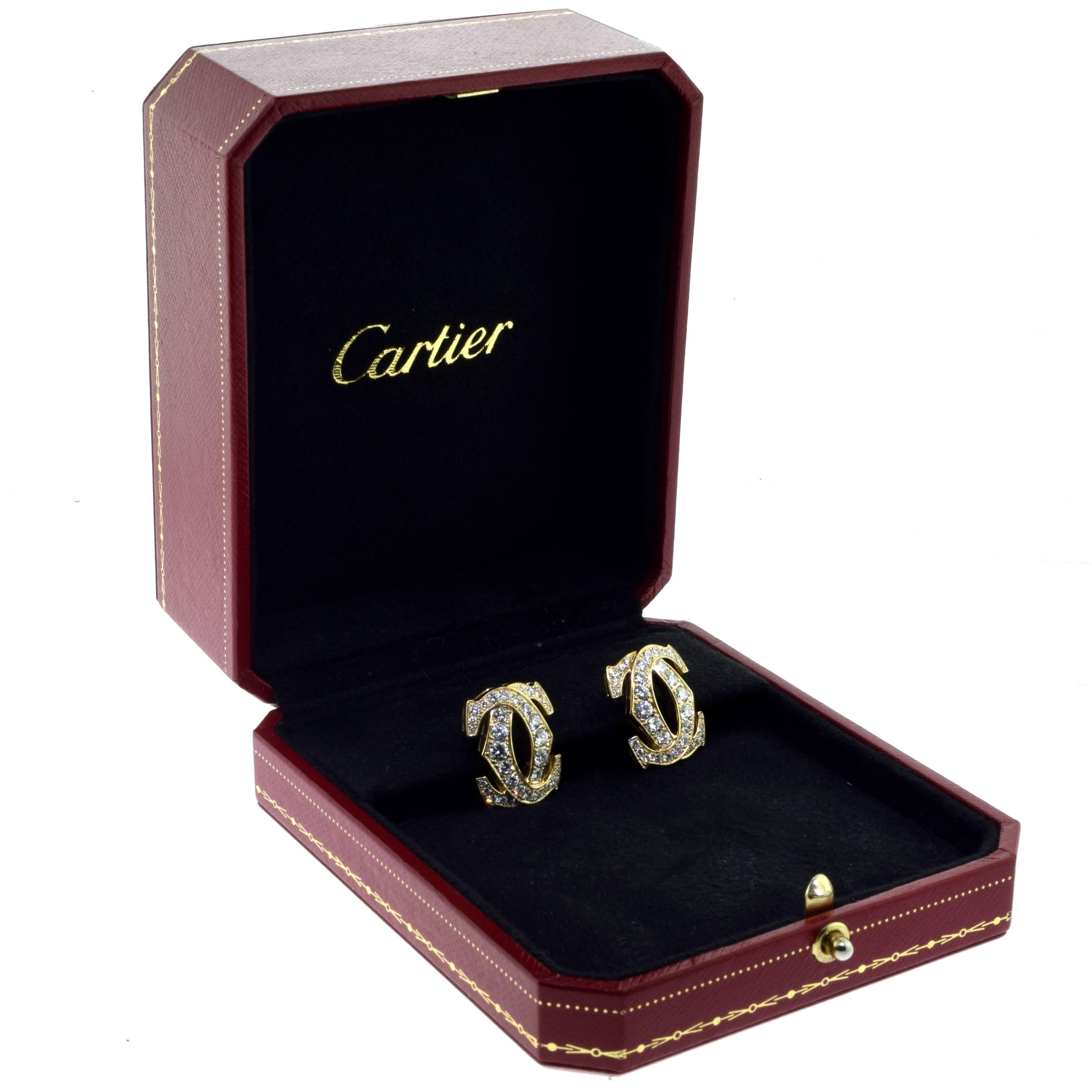 Designer: Cartier
Collection: Double C
Metal: Yellow Gold
Metal Purity: 18k
Stones: Brilliant Round Cut Diamonds
Total Carat Weight: 2.27 ct
Color / Clarity: E - F / VVS 
Dimensions: 20.55 x 16.19 mm
Total Item Weight (g): 14.0
Hallmark: Cartier