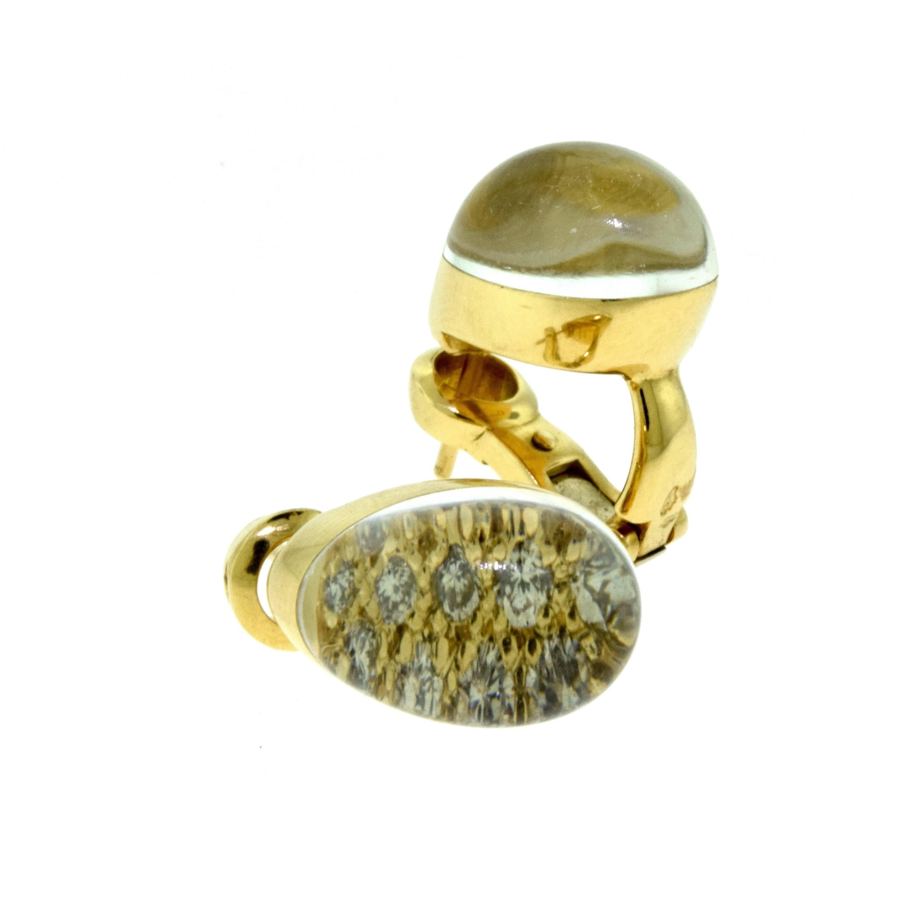Designer: Cartier
Collection: Myst de Cartier
Metal: Yellow Gold
Metal Purity: 18k
Stones: Round Brilliant Cut Diamonds, Dome Shaped Rock Crystal
Total Item Weight (g): 10.8
Dimensions: 9.29 x 13.51 mm
Hallmark: Cartier 750 Serial No. 
Type: