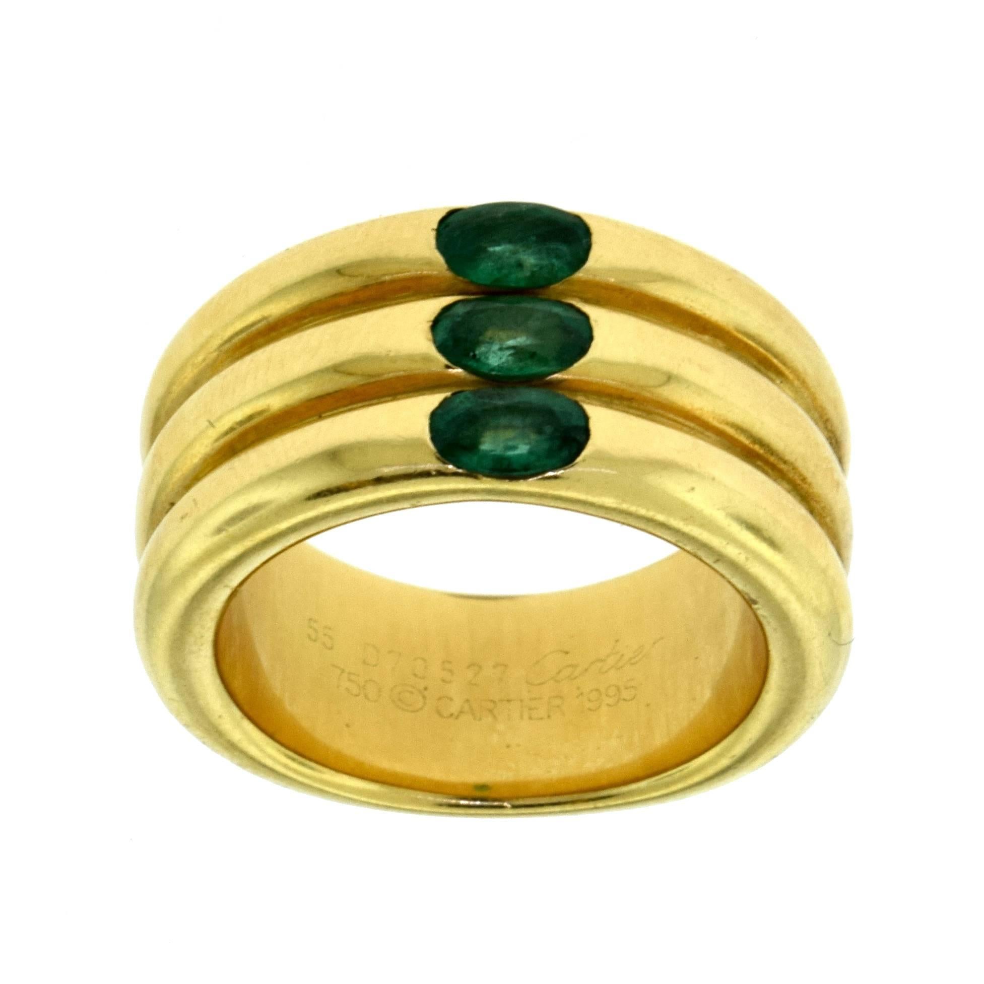 Women's or Men's Vintage Cartier Yellow Gold Ellipsed Three Band Fused Three Emerald Ring