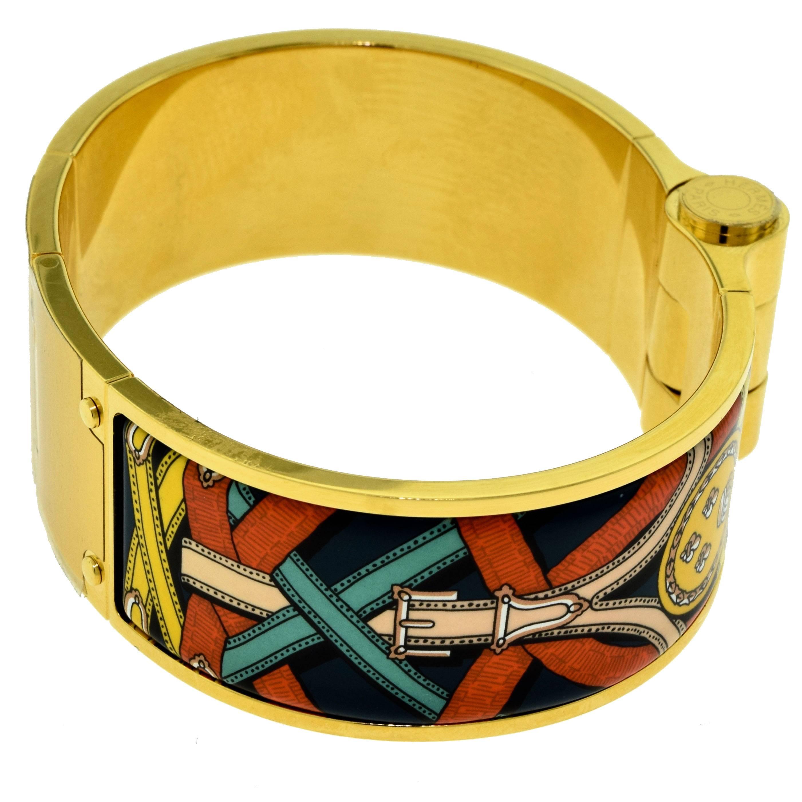 Designer: Hermes
Model: Cavalcadour à Cheval
Type: Hermes wide hinged bracelet
Size: Small
Metal: Yellow Gold
Metal Purity: 18k
Non-Metal Material: Enamel
Color: Futurisme
Total Item Weight (g): 77.3
Width Dimension: 1 inch
Retail: $660.00
