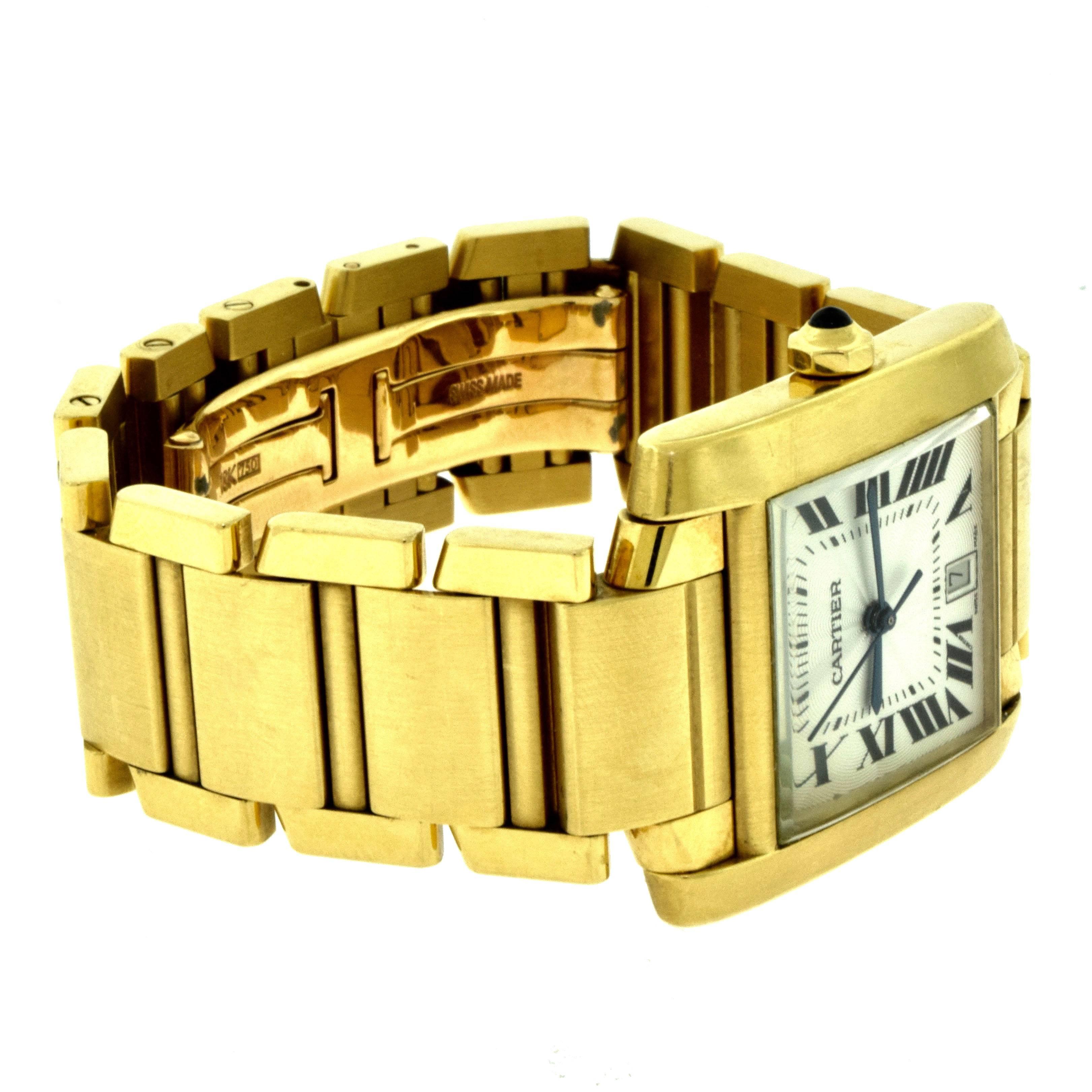 Designer: Cartier
Collection: Tank
Model Name: Française 1840
Movement: Automatic
Case Shape: Tank
Case Material: 18k Yellow Gold
Case Diameter: 28 mm
Watch Length: 32 mm
Watch Height: 8 mm
Hand Style: Sword, Blued Steel
Numerical Style: Roman
Dial