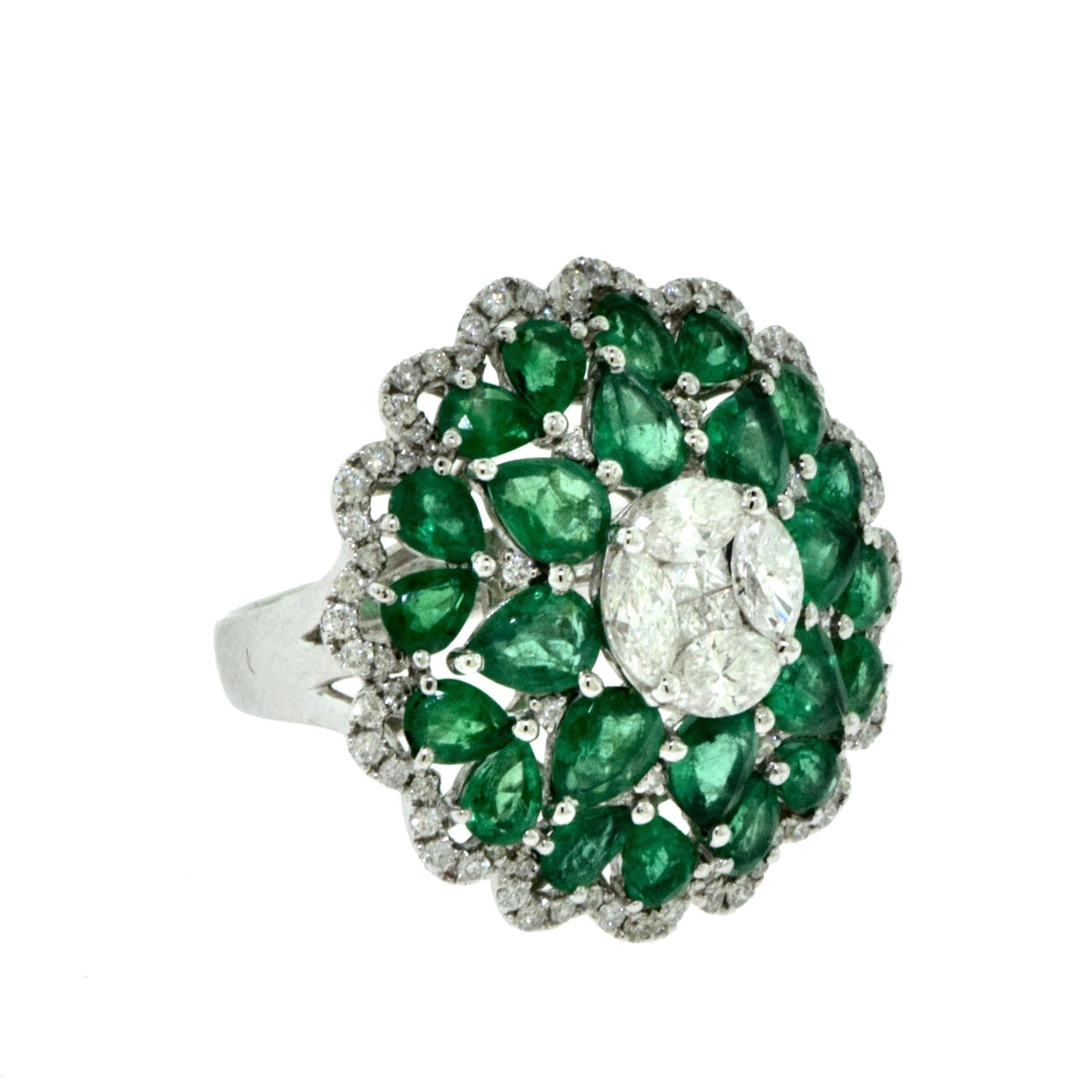 Metal: White Gold

Metal Purity: 18k

Stones: Emeralds ; Diamonds

Total Carat Weight: 5.35 ct

Emerald Carat Weight: 4.30 ct

Diamond Carat Weight: 1.35 ct

Color Grade: G – H

Clarity Grade: VS

Ring Size: 7 (sizable)

Ring Diameter: 25.4 mm

Ring