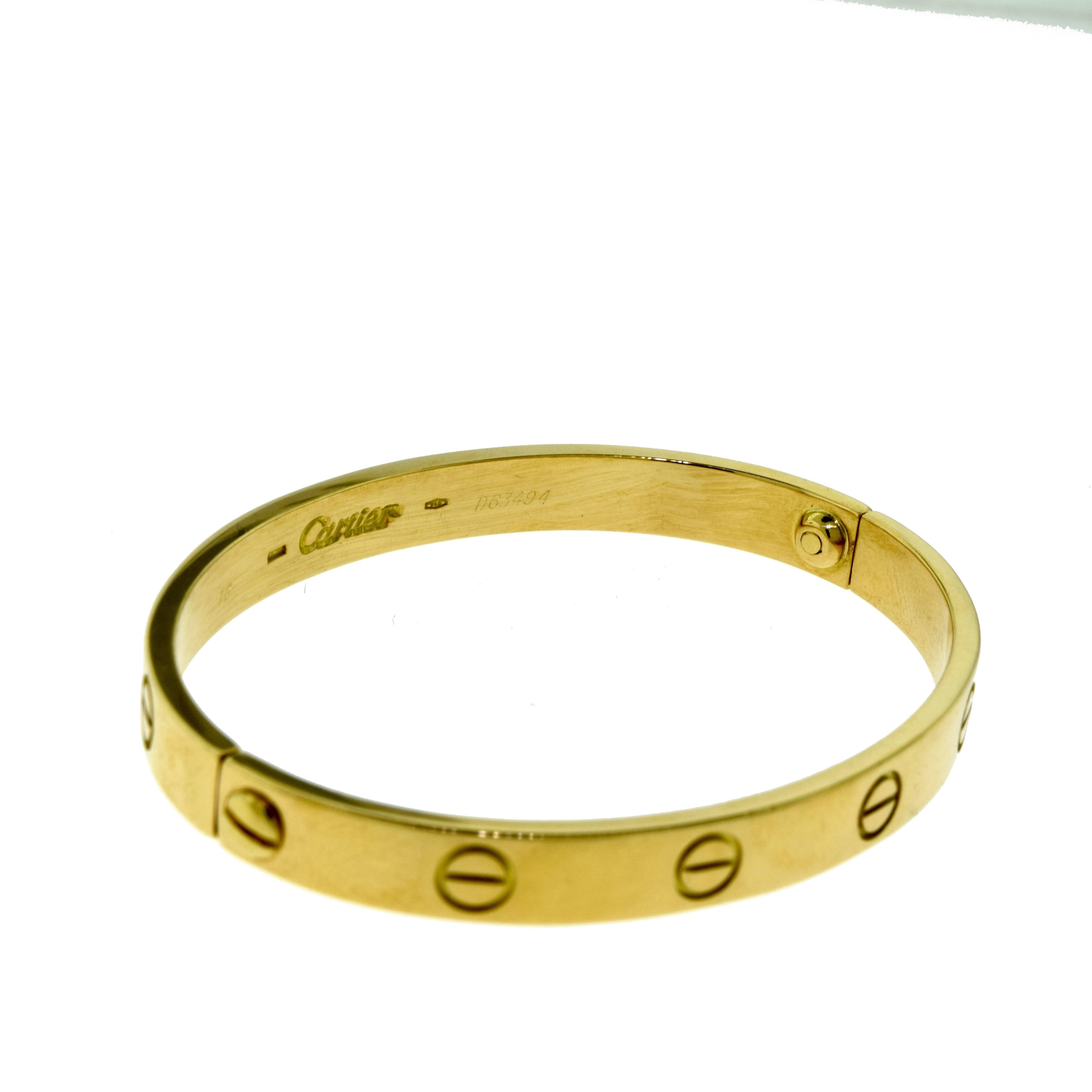 From Cartier's Iconic LOVE Collection:
Size: 16 = 16 cm

Metal: 18 Karat Yellow Gold
Total Item Weight (g): 28.1
Screw System: Old Screw
Hallmark: Cartier 16 Serial Number

Comes with Certificate of Authenticity, Box, and Screwdriver 