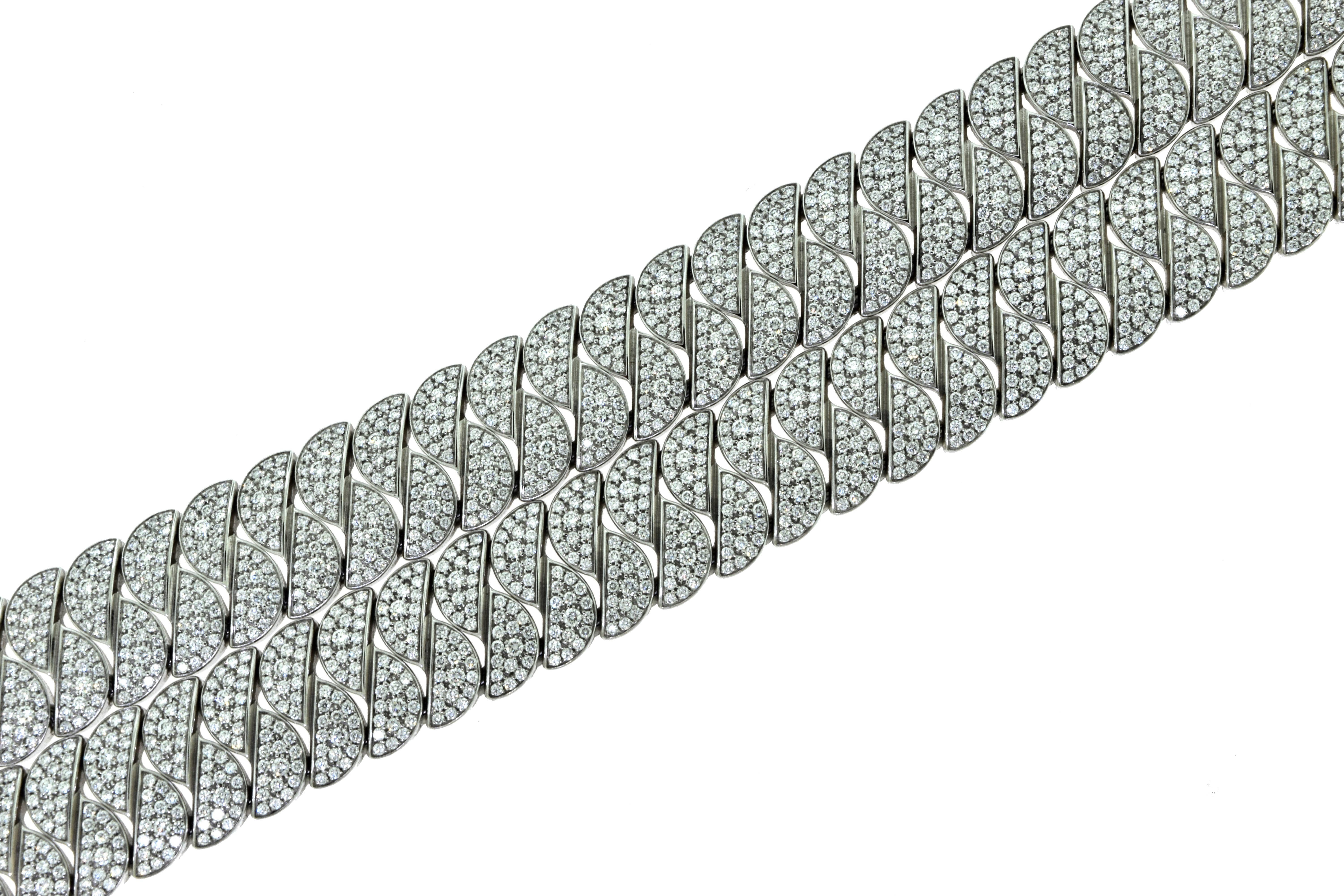 Cartier: a Diamond 'LA DONA' Bracelet designed as an articulated double row of pavé-set brilliant-cut diamond semi-circular shaped links, to a concealed clasp

Designer: CARTIER
Style: La Dona
Metal: White Gold
Metal Purity: 18k
Stones: