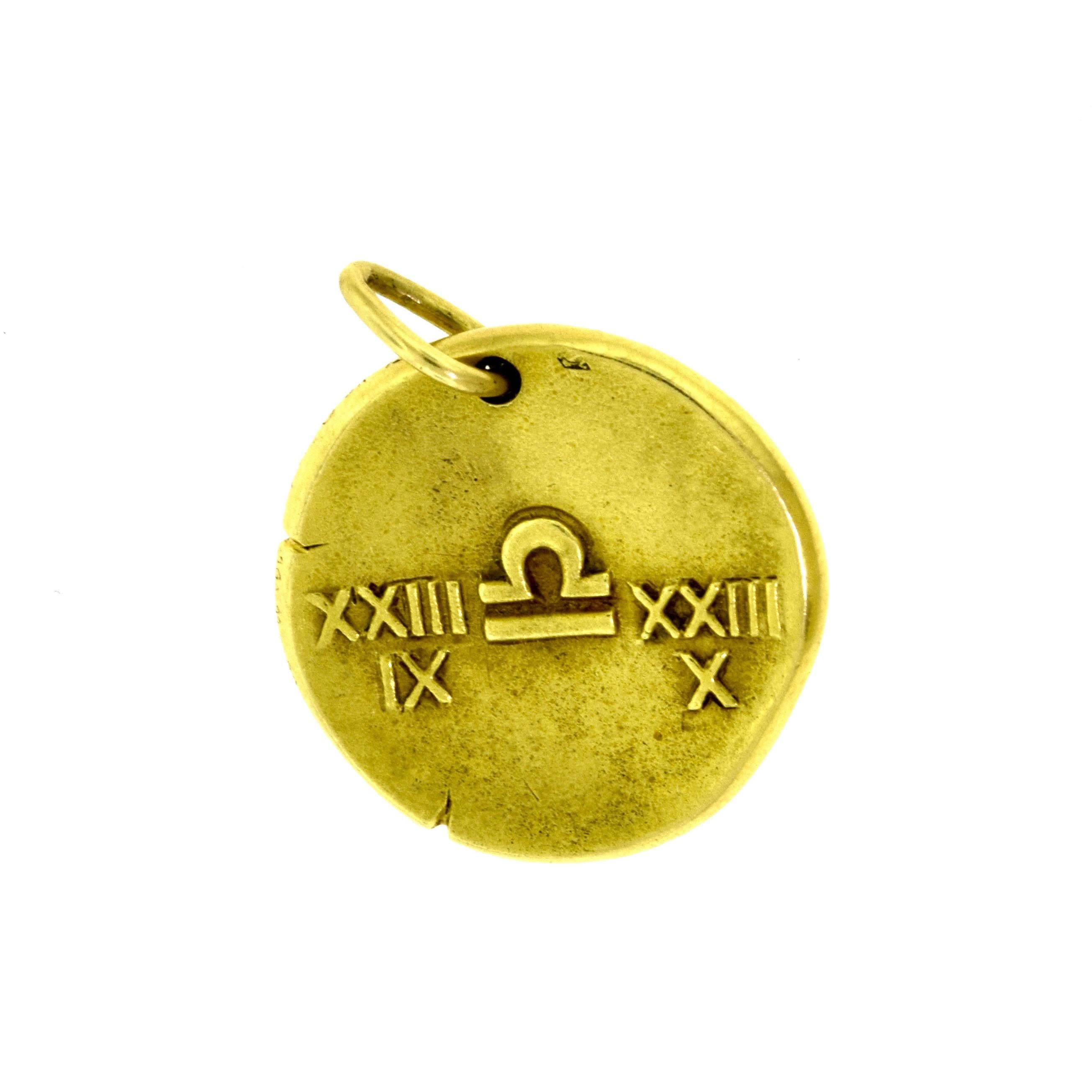 Designer: Van Cleef & Arpels
Metal: 18 KaratYellow Gold
Total Item Weight (g): 16.2
Diameter: approx. 27 mm
Thickness: 2.98 mm
Hallmark: VCA 750 OR Serial Number

Libra Zodiac medallion pendant in 18k yellow gold, designed to resemble an ancient