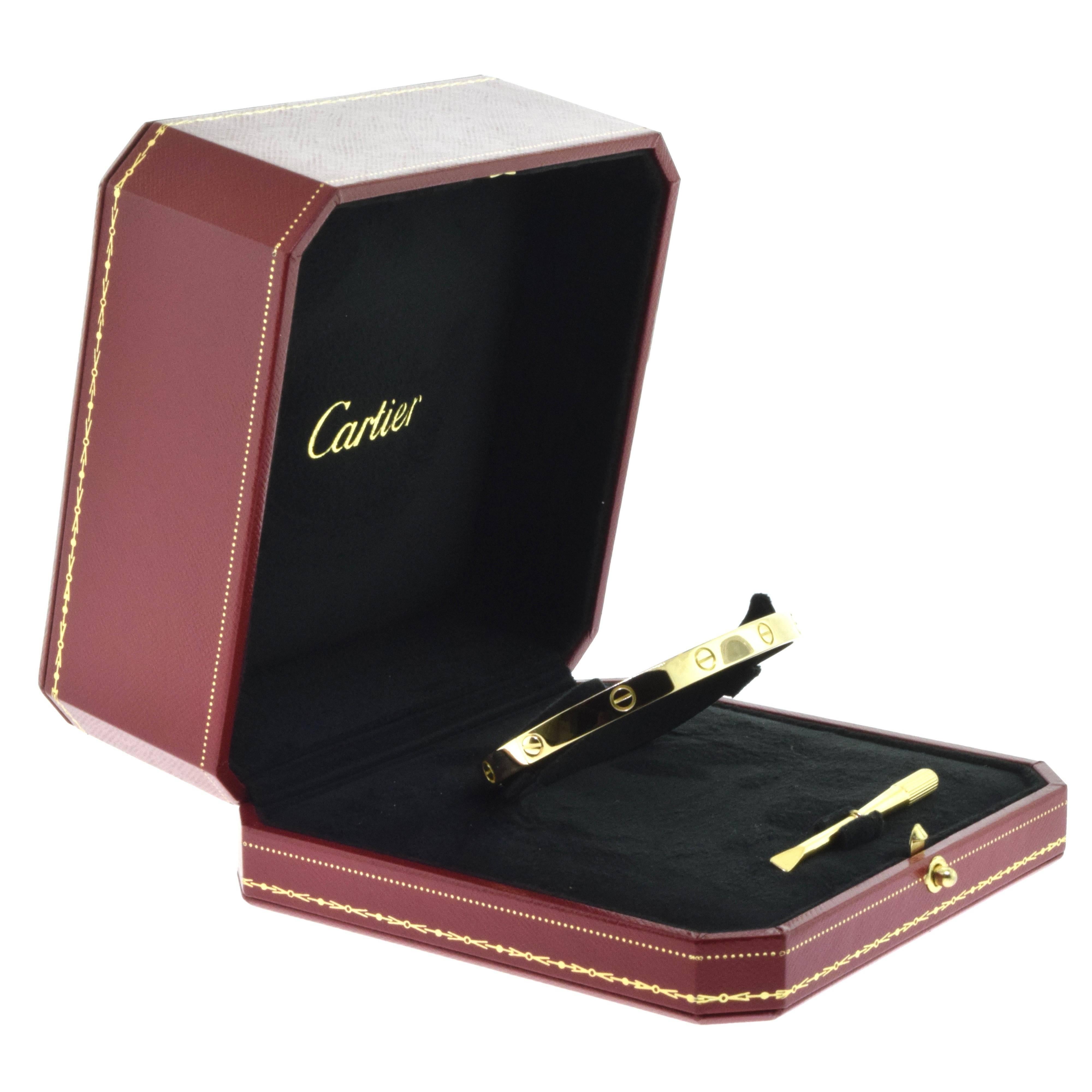 From Cartier's LOVE Collection:
A gorgeous 18 Karat Yellow Gold LOVE Bangle in Size 21 (21 cm). 

Total Item Weight (g): 34.1
Hallmark: Cartier 750 Serial No.
Screw System: Old Screw
Retail: $6,300.00 (excl. sales tax)
Comes with Box and Screwdriver