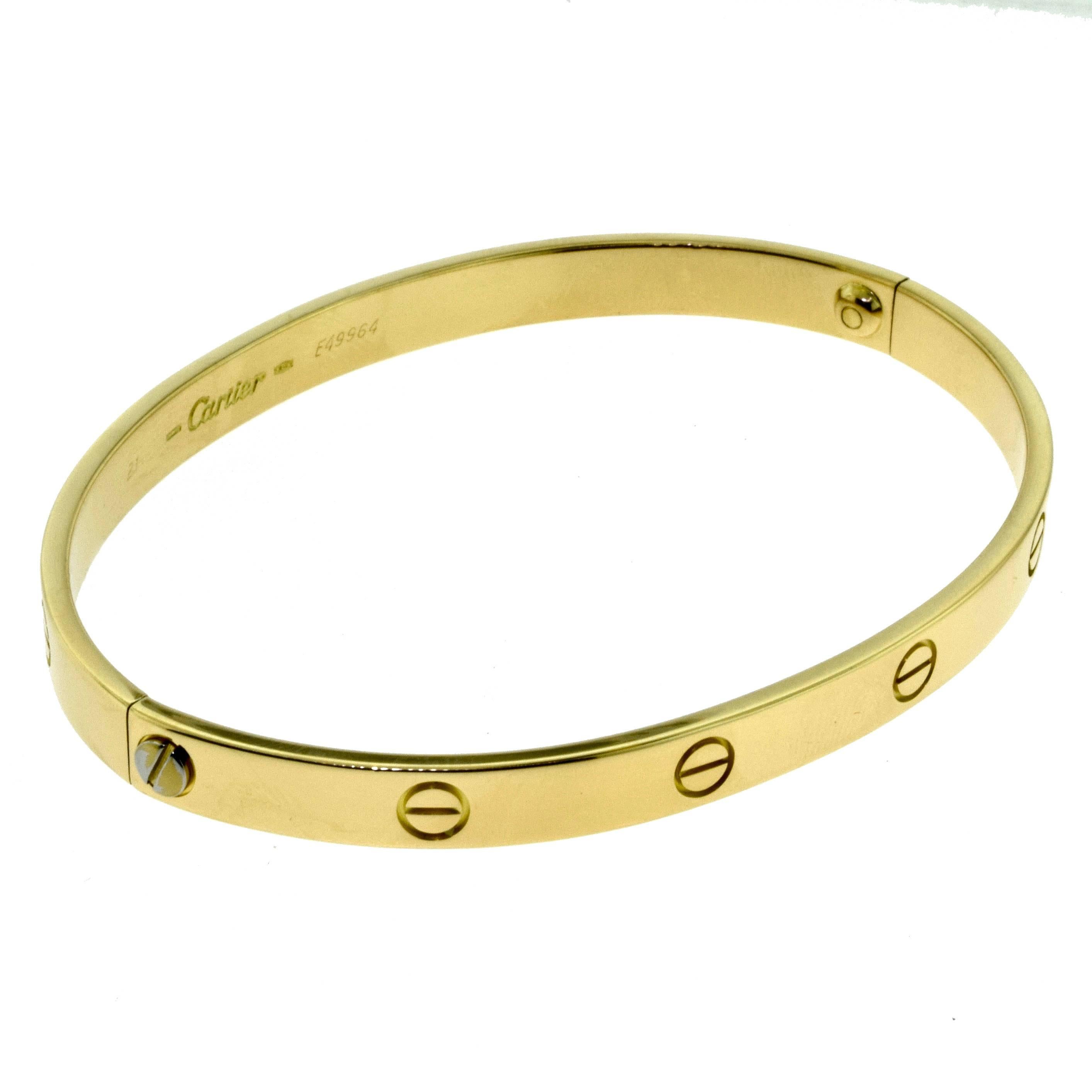From Cartier's LOVE Collection:
A gorgeous 18 Karat Yellow Gold LOVE Bangle in Size 21 (21 cm). 

Total Item Weight (g): 38.8
Hallmark: Cartier 750 Serial No.
Screw System: Old Screw
Retail: $6,300.00 (excl. sales tax)
Comes with Box and Screwdriver