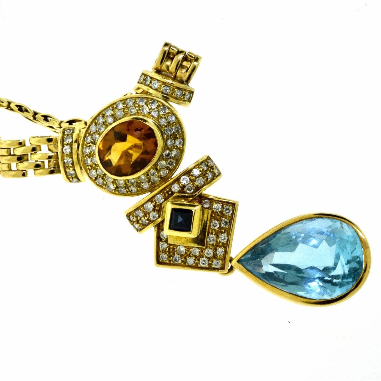 Earrings:
Metal: 18k Yellow Gold
Stones: 1 Pear Shaped Blue Topaz
              1 Square Sapphire
              1 Oval Citrine
              35 Round Brilliant Diamonds
Blue Topaz Weight: 10 ct
Blue Topaz Dimensions: 19.69 x 13.06 x 13.65 mm
Citrine
