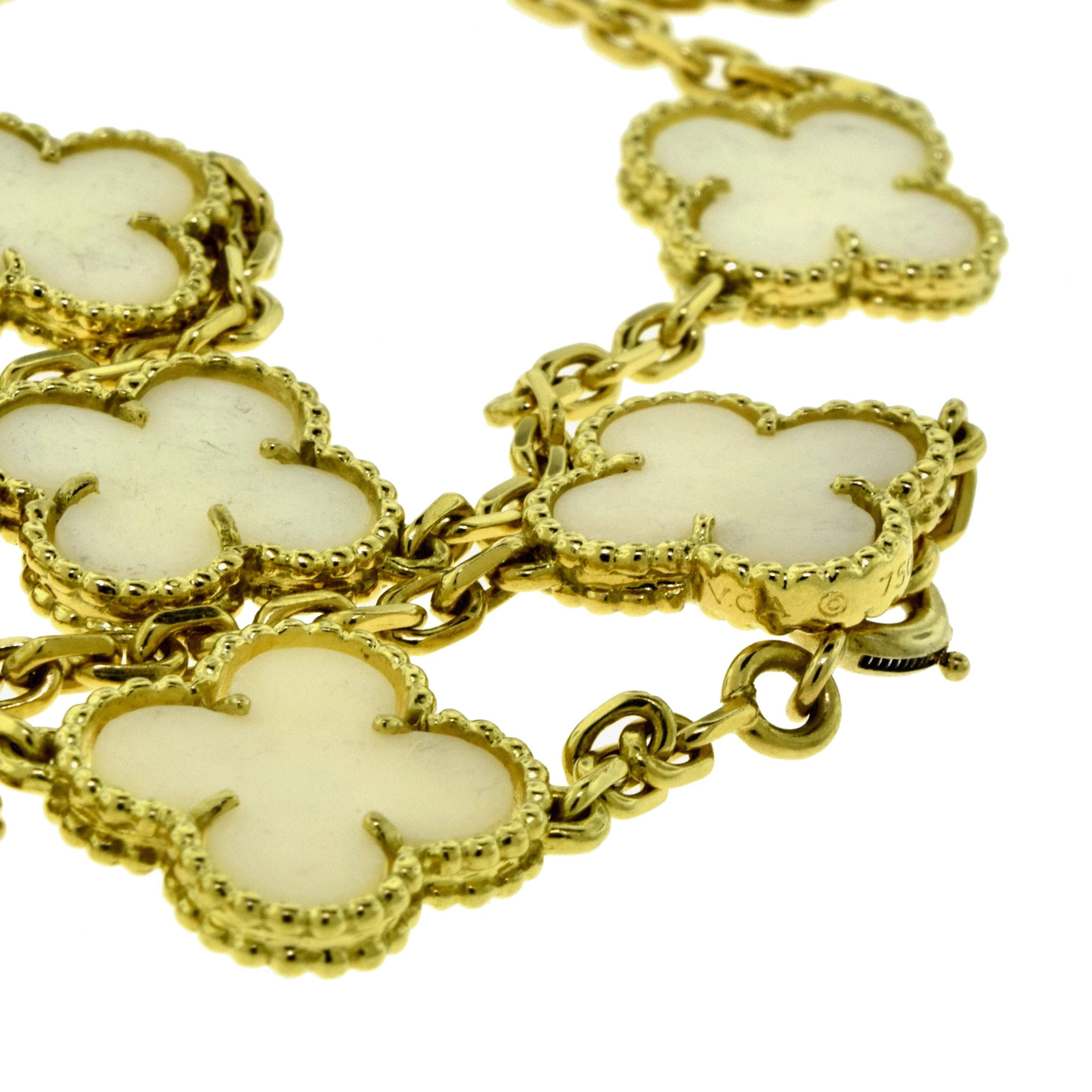 Van Cleef & Arpels White Coral Vintage Alhambra 20 Motif Yellow Gold Necklace In Excellent Condition For Sale In Miami, FL