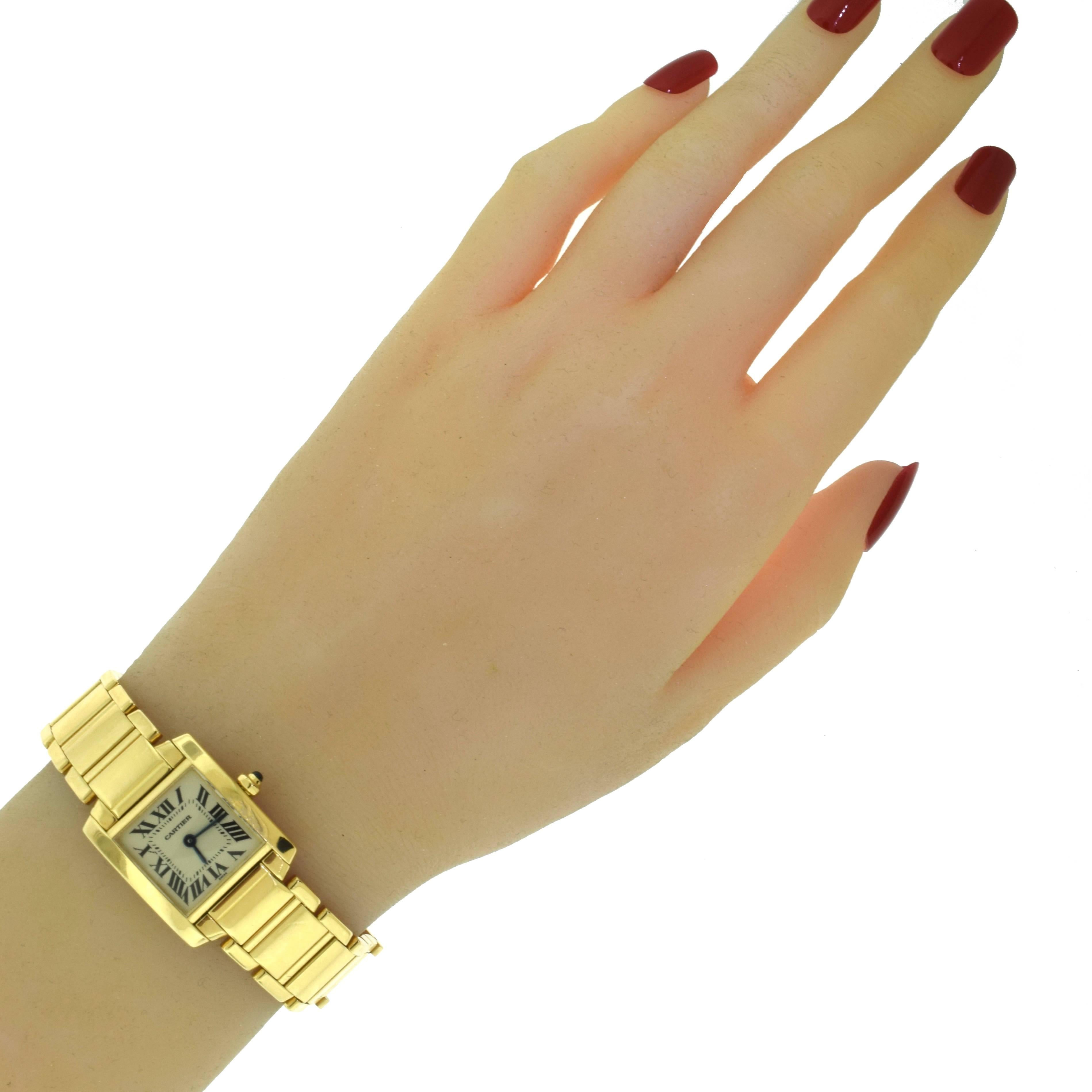 Designer: Cartier
Collection: Tank
Model Name: Française
Ref. Number: 1820 
Movement: Quartz
Case Size: 20 mm in width (without crown), 25 mm in length (with lugs)
Case Shape:  Rectangle
Case Material: 18k Yellow Gold
Hand Style: Sword, Blued